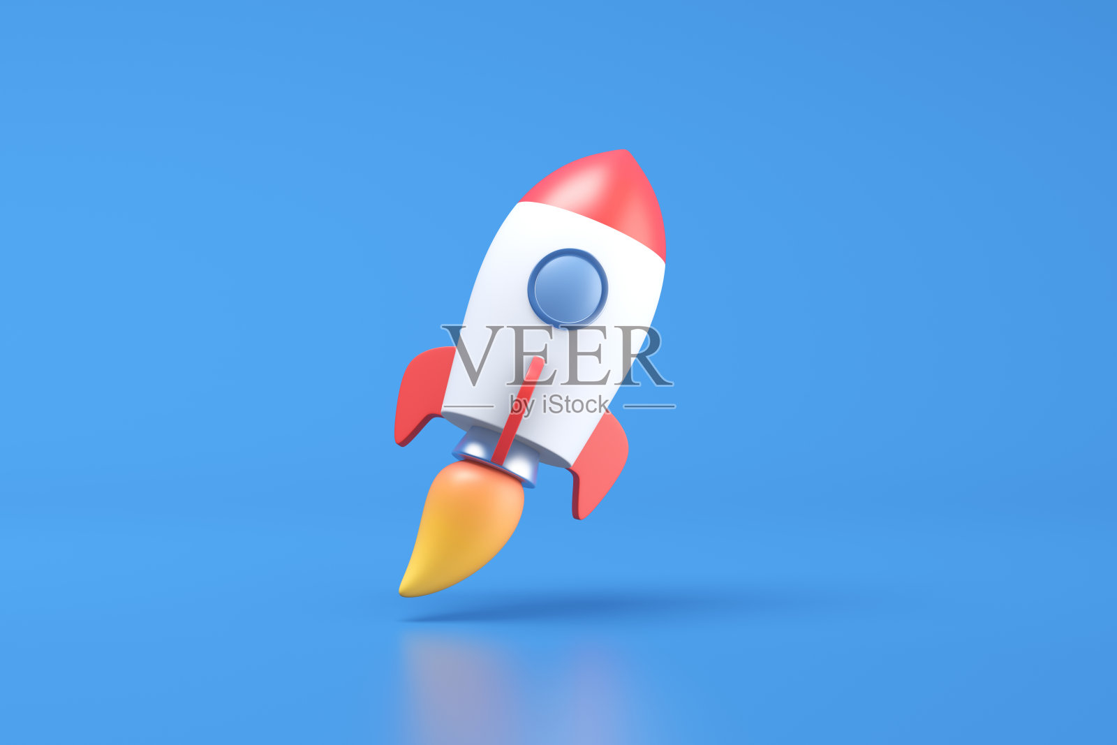 蓝色背景上的太空火箭照片摄影图片