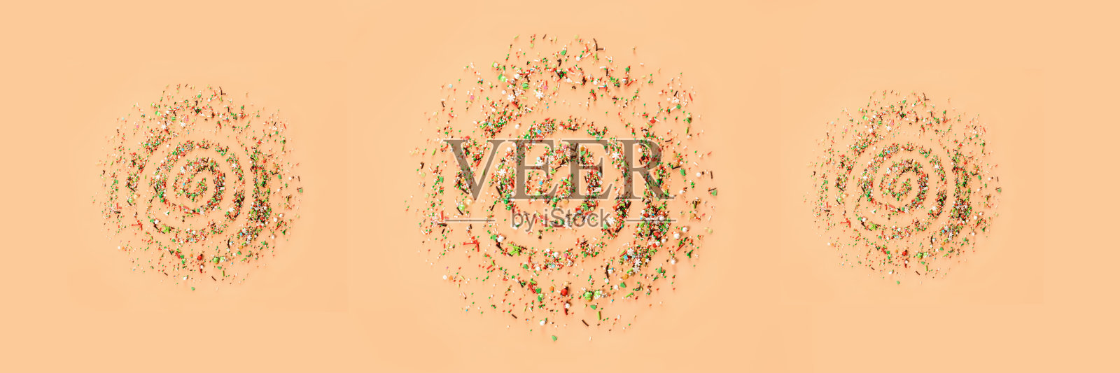 从糖果散落成圈。照片摄影图片