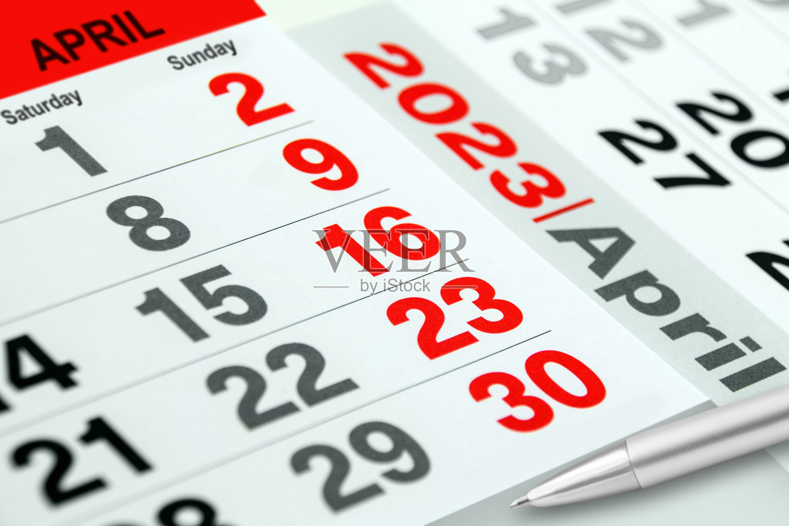 日历2023年4月星期六星期日铅笔关闭照片摄影图片