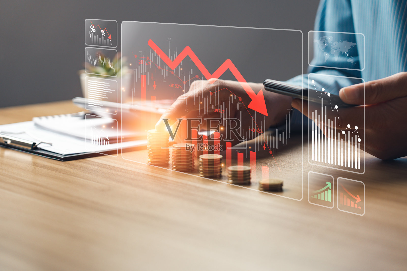 经济崩溃的概念，商人与下降的财务图表由于全球经济衰退。股市崩盘，通货膨胀，金融危机，GDP收入下降，资本减少，损失照片摄影图片