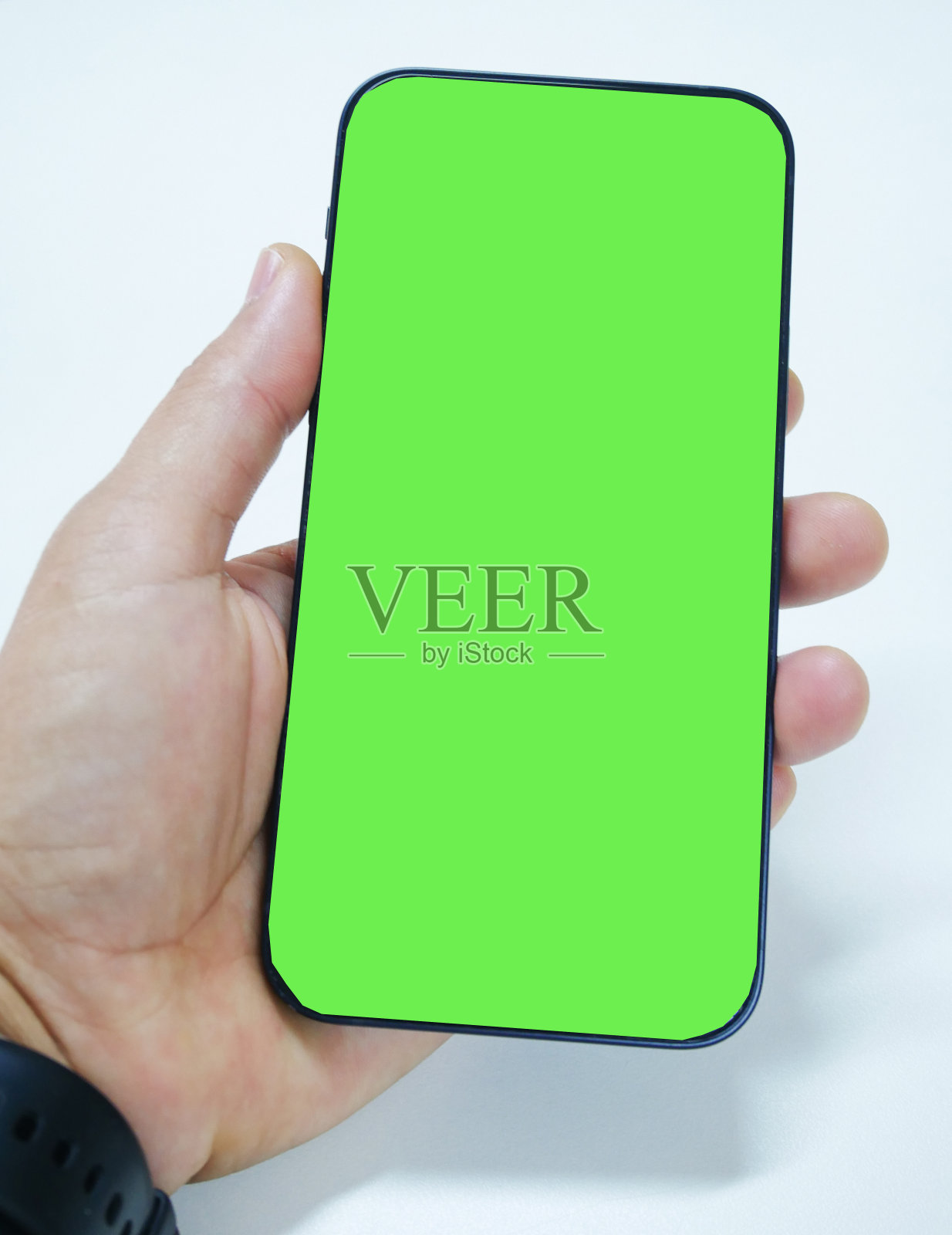 技术概念上的绿屏智能手机。照片摄影图片