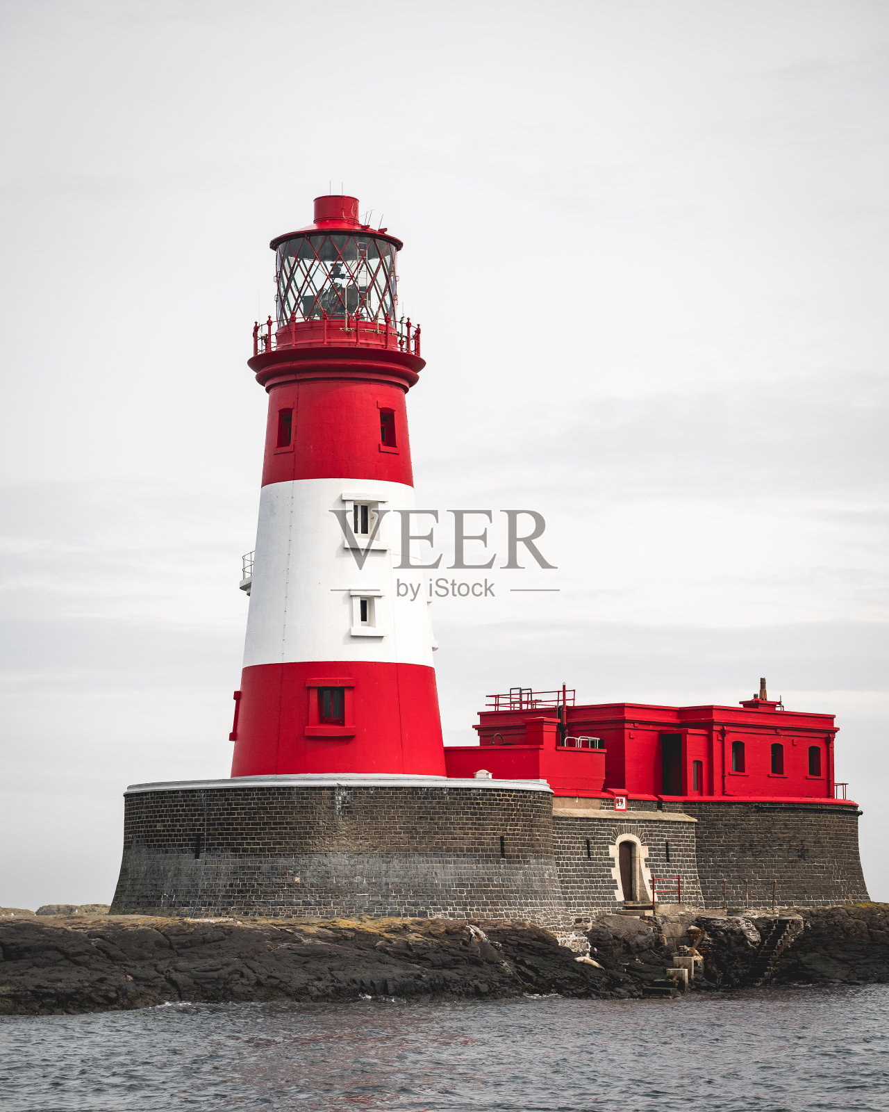 东北海岸外的灯塔照片摄影图片