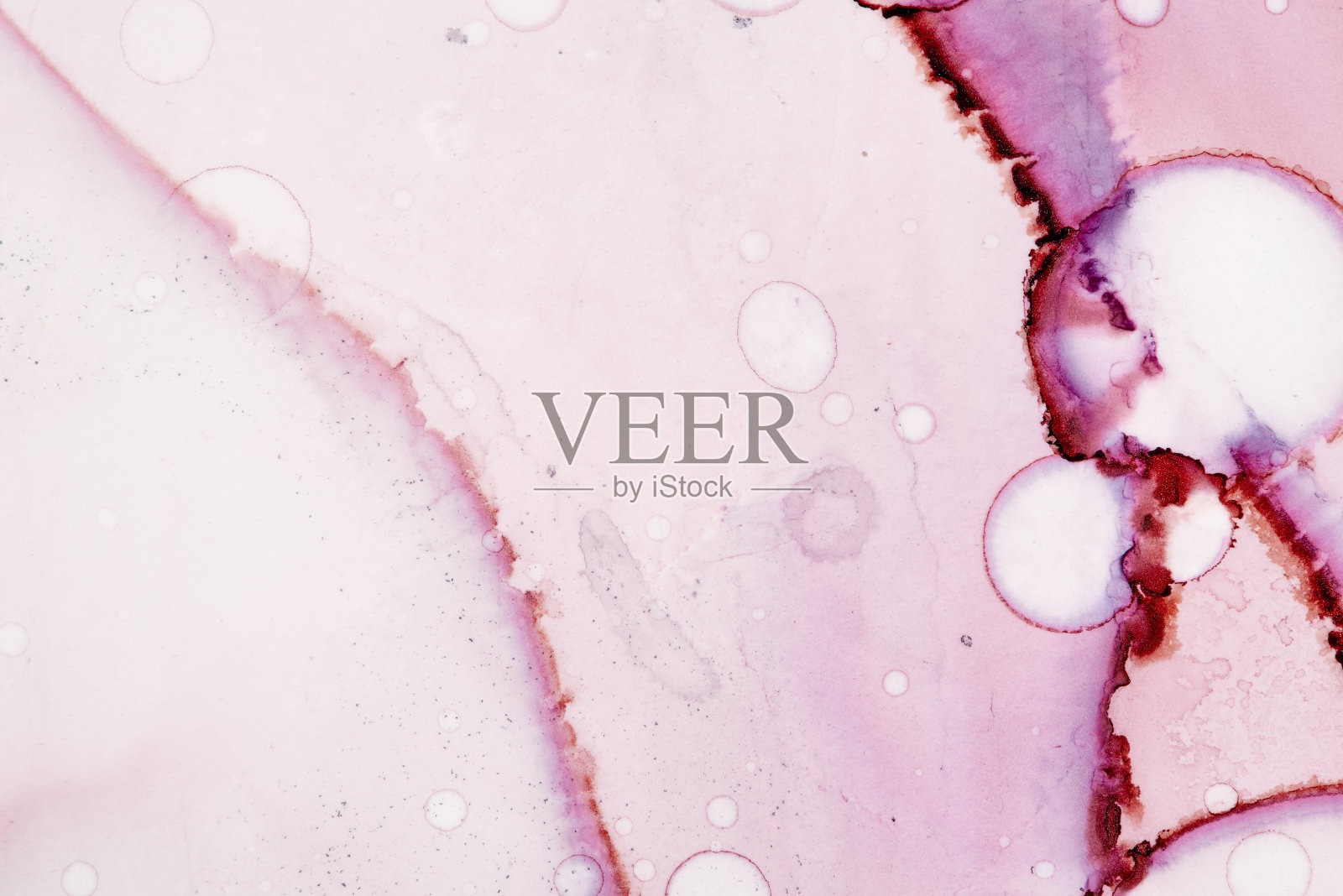 各种色调的水彩在旧纸纹理背景。照片摄影图片