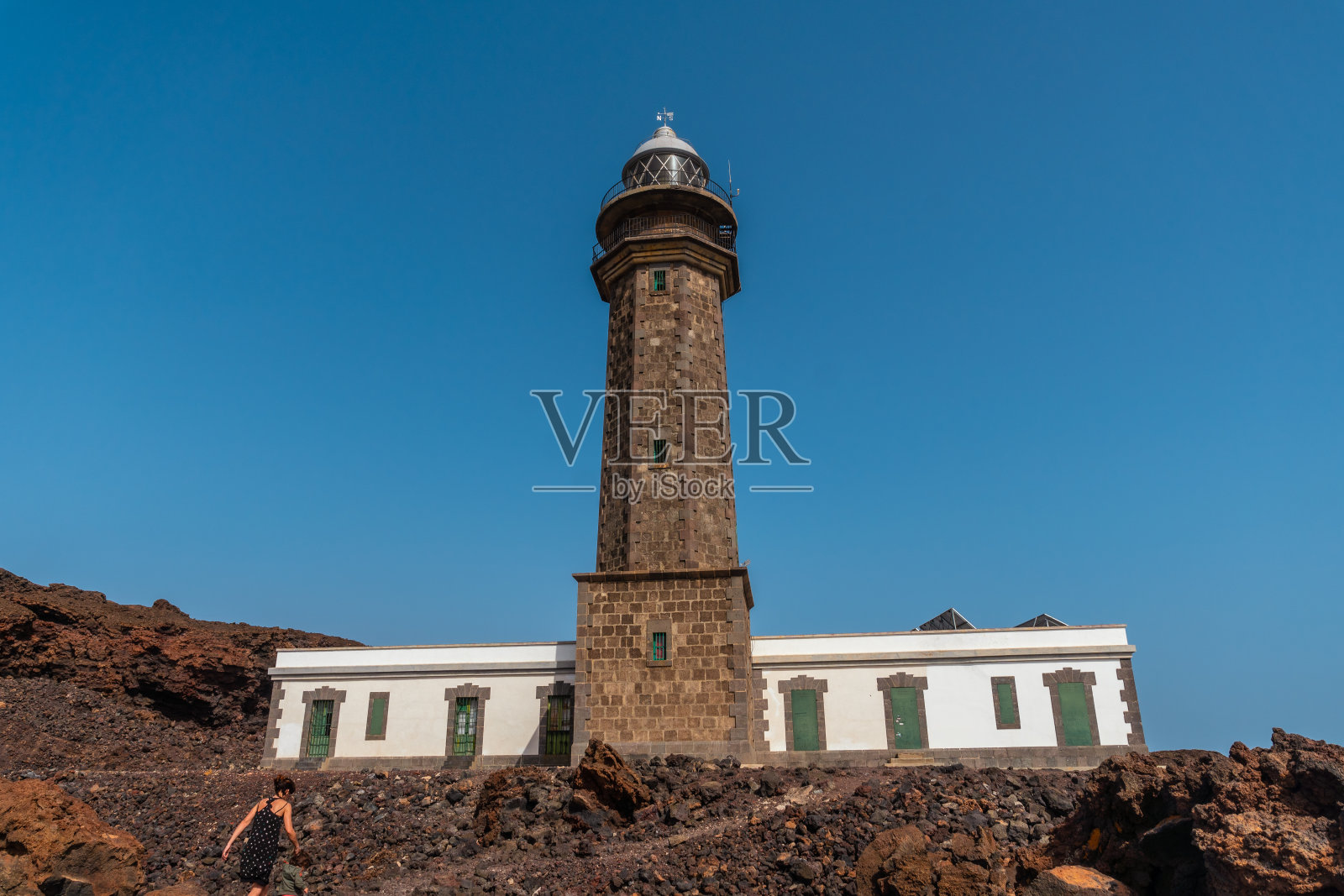 耶罗岛西南海岸美丽的奥尔奇拉灯塔上的火山石。加那利群岛照片摄影图片