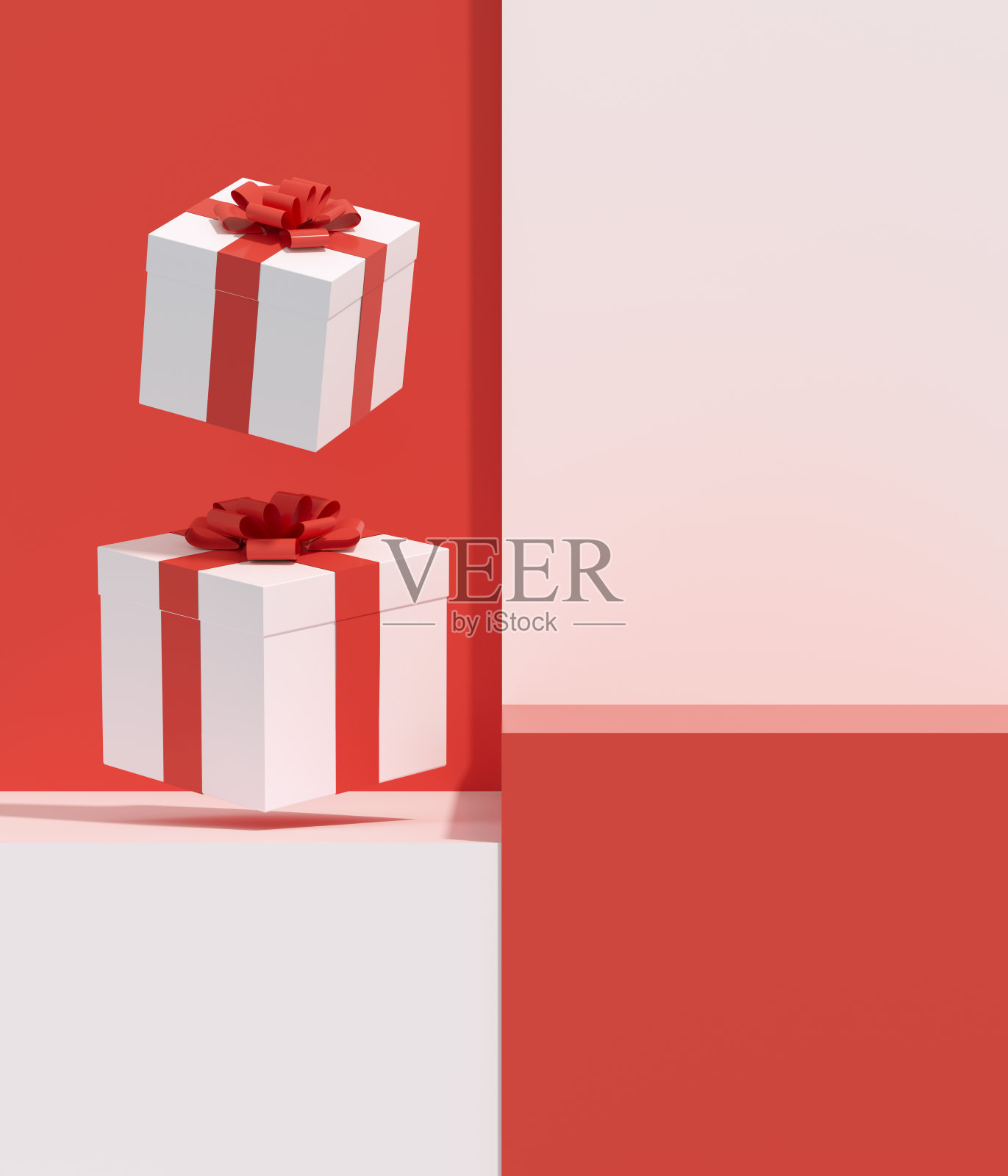 讲台上的礼盒，红白相间的背景照片摄影图片