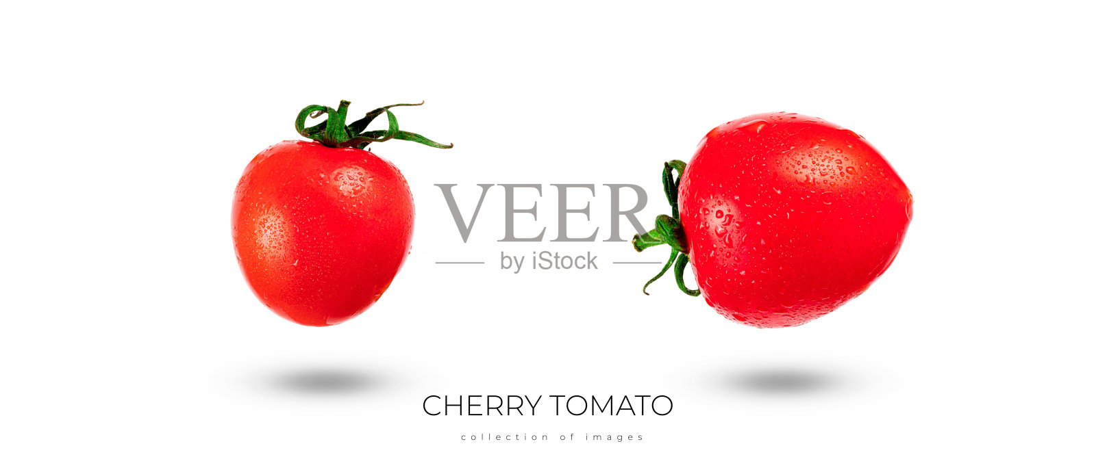 白色背景上分离的樱桃番茄。掉落的圣女果。照片摄影图片