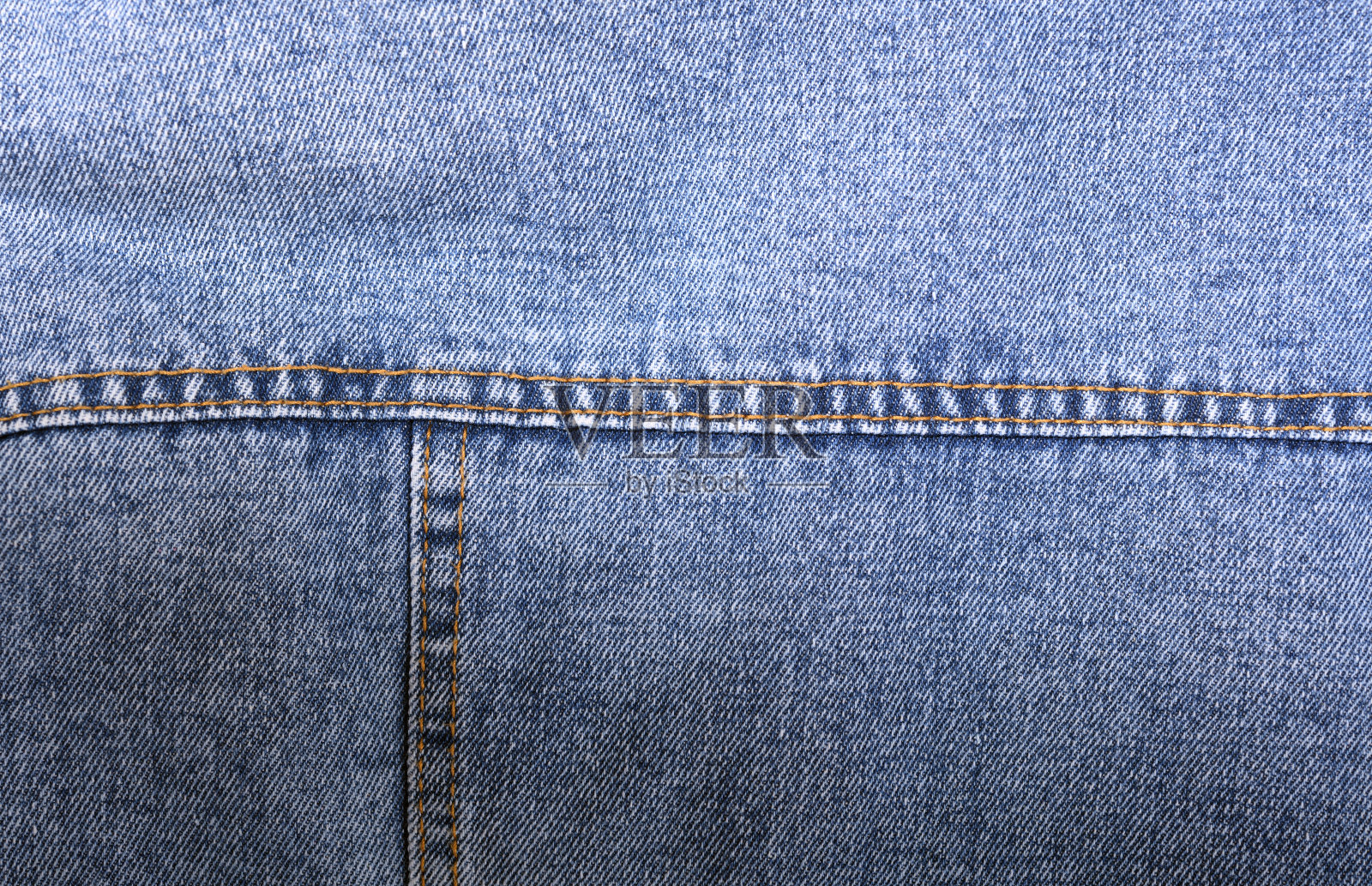 蓝色牛仔裤的背景和纹理接近。牛仔布缝。照片摄影图片