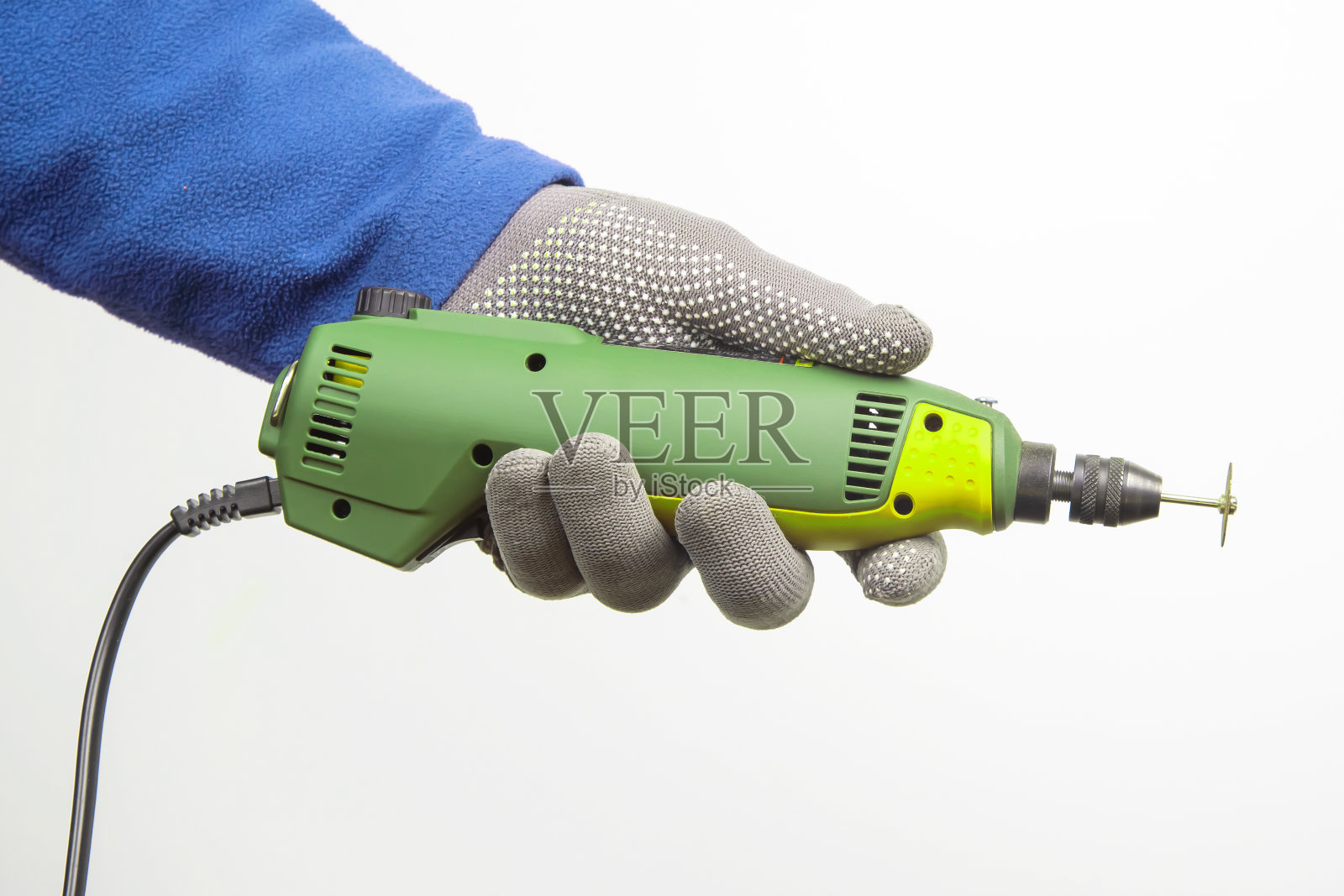 在白色背景上用手切割和加工金属和其他物体的雕刻工具。锁匠行业照片摄影图片