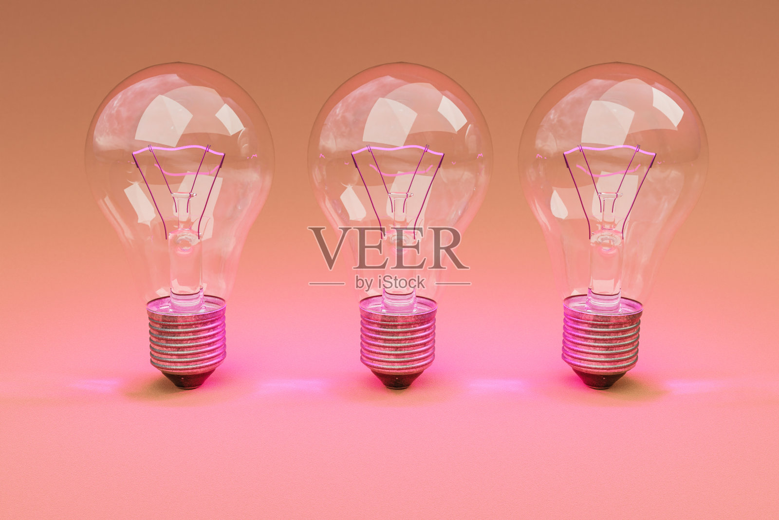 三个复古风格的灯泡，在无限多彩的橙色背景上，发光的灯丝排成一排;创意设计理念;三维演示照片摄影图片