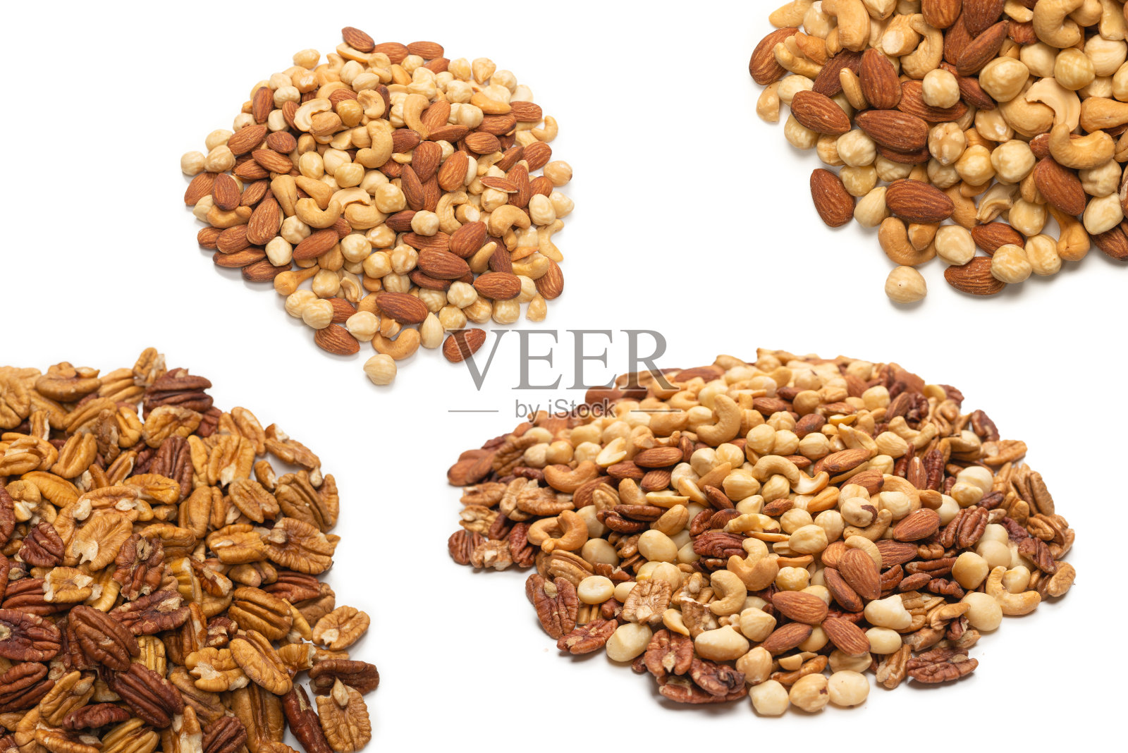 在白色背景上孤立的山核桃。照片摄影图片