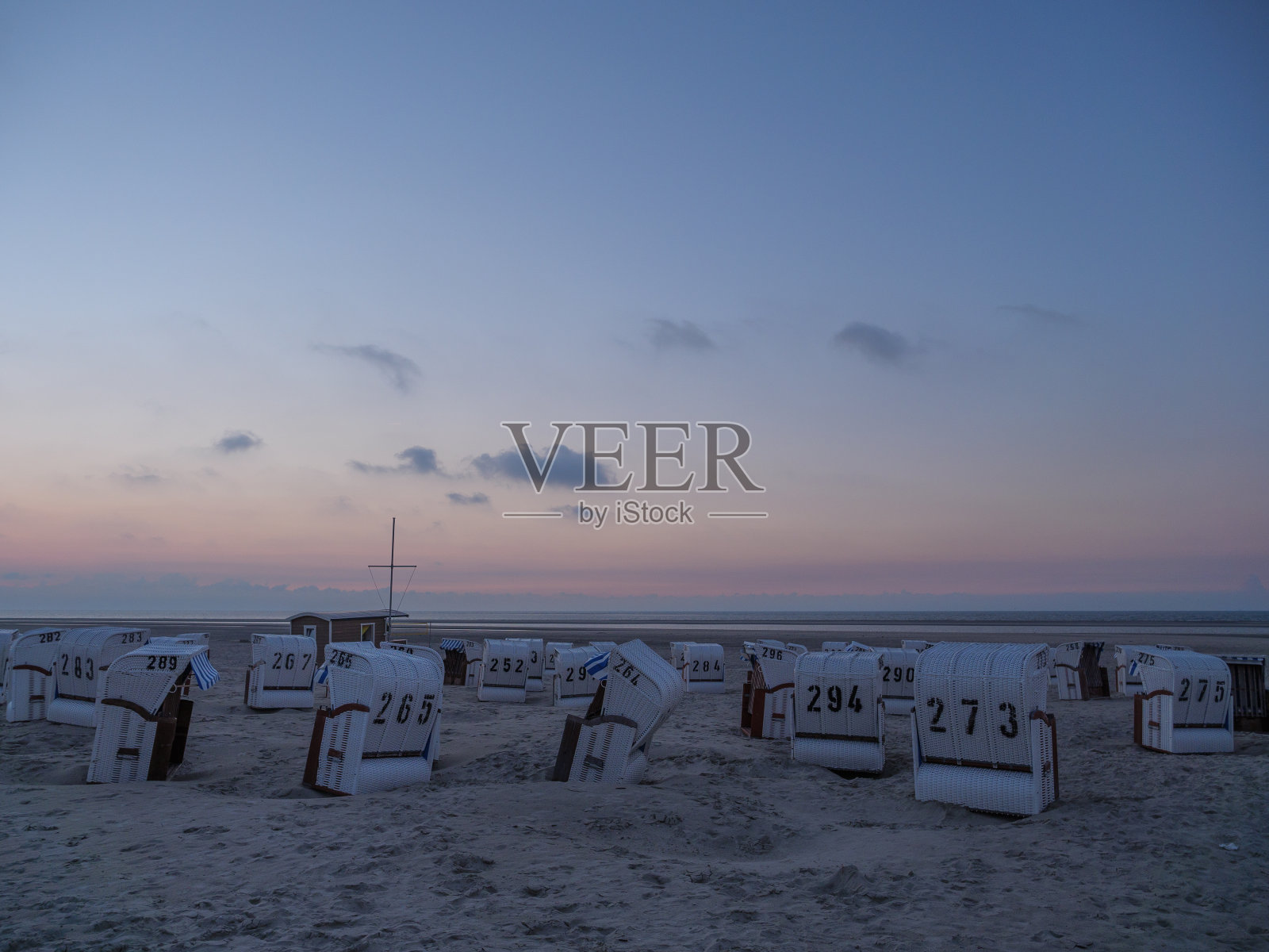 德国北海施皮克鲁格海滩的日落照片摄影图片