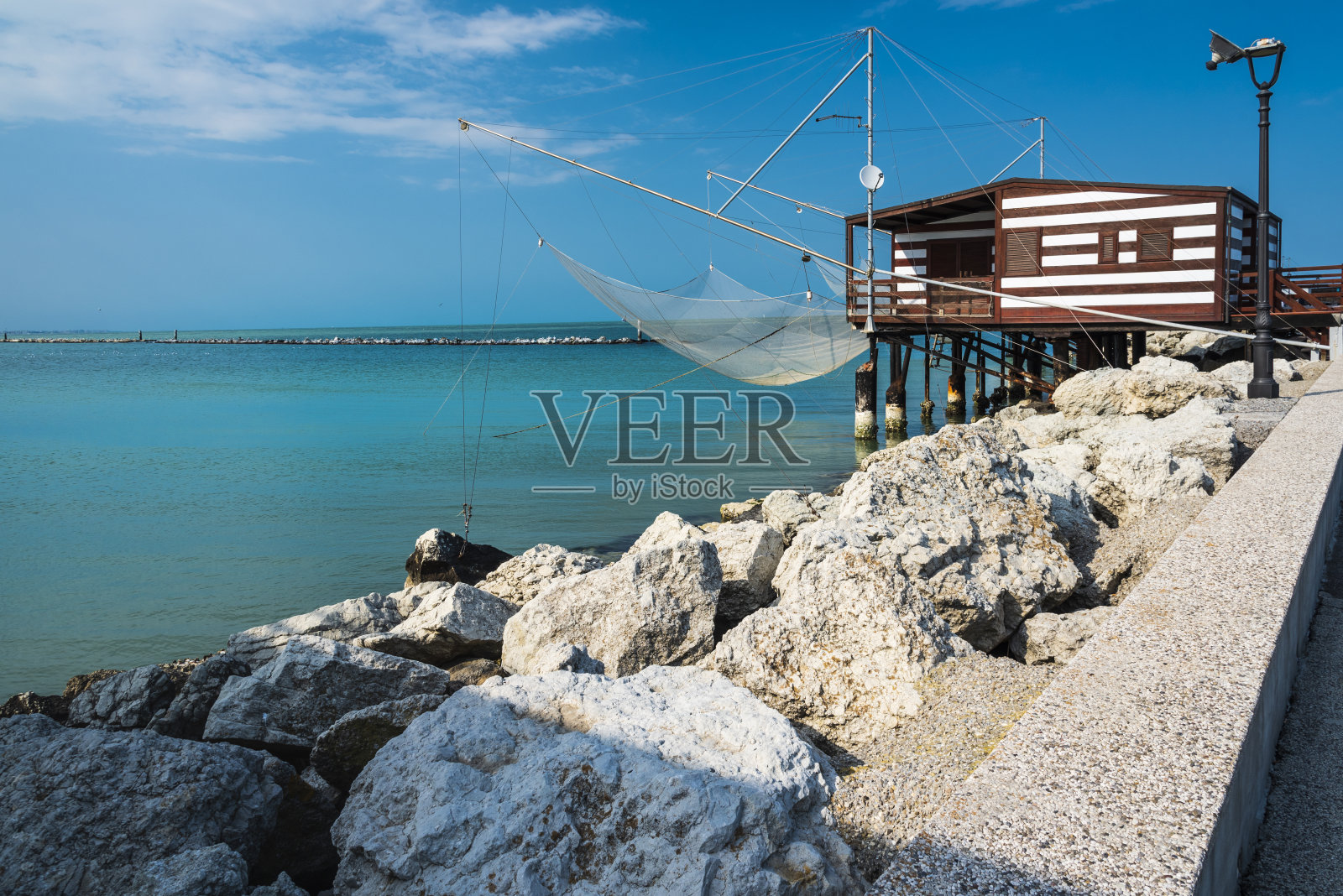 切塞纳蒂科及其运河港口。照片摄影图片