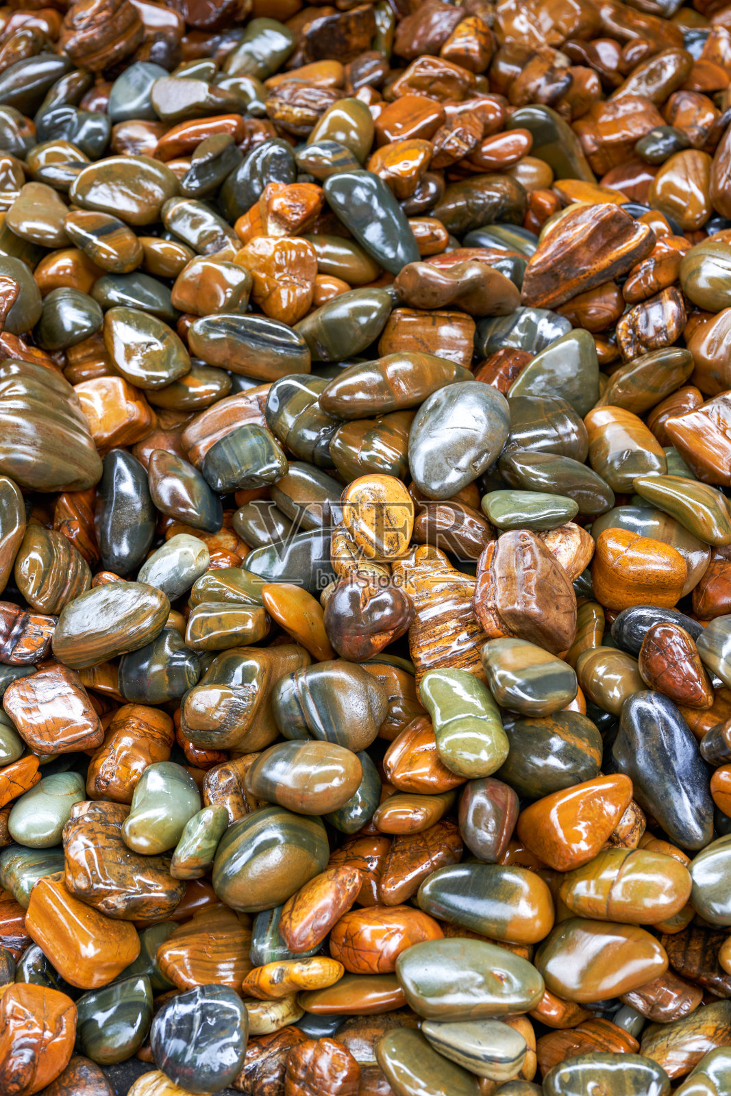 一堆闪闪发光的鹅卵石的特写照片摄影图片