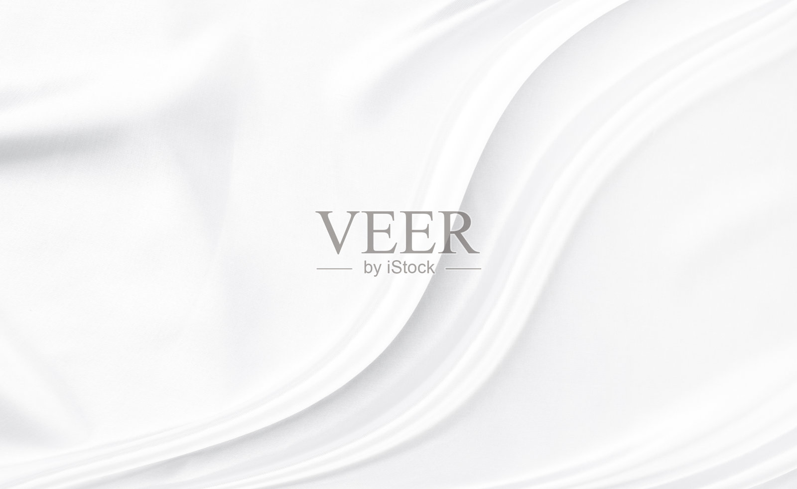 白灰色绸缎质地，即白色银色面料，真丝为底色，具有美丽柔和的自然模糊花纹。照片摄影图片