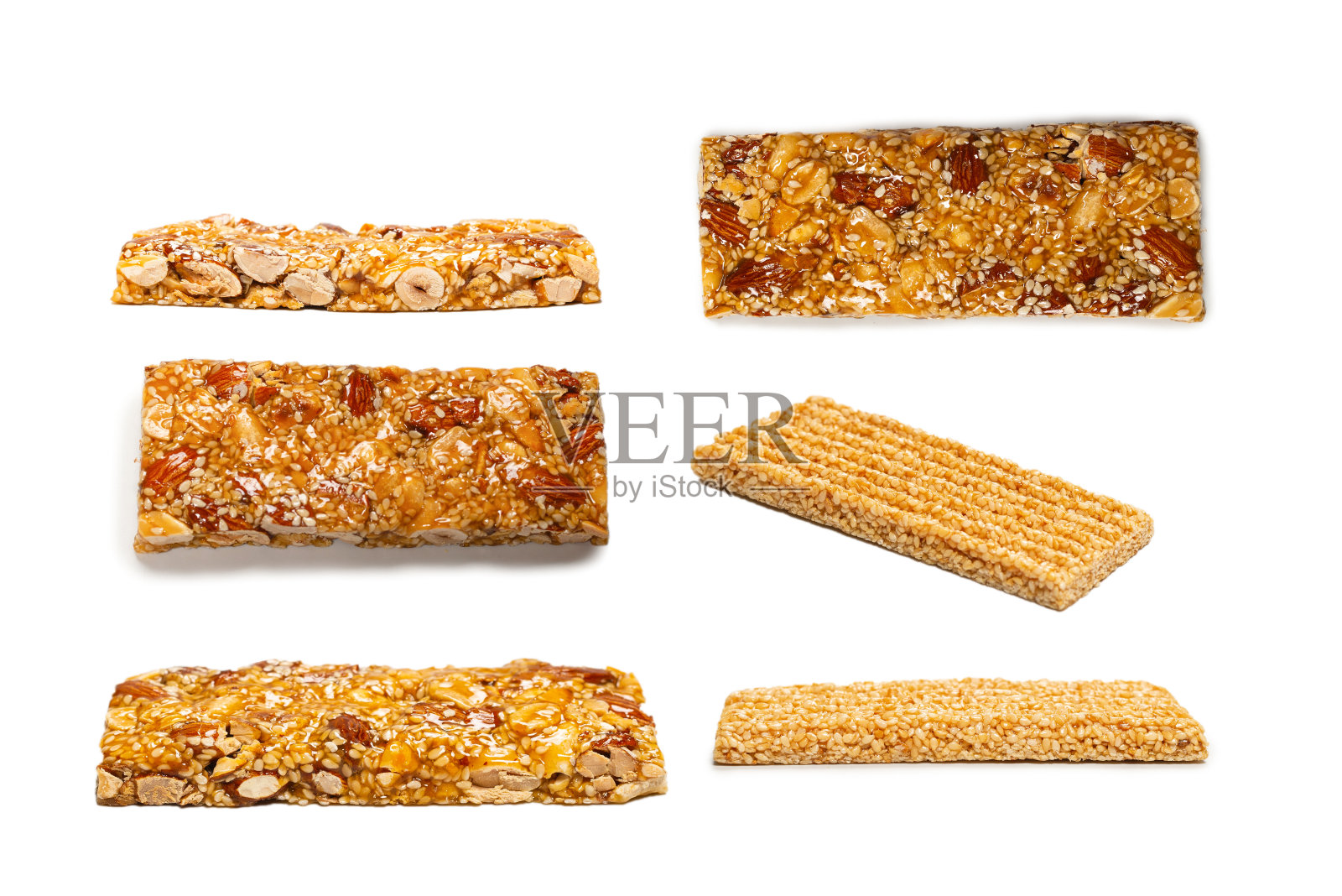 在白色背景上分离出坚果混合物。照片摄影图片