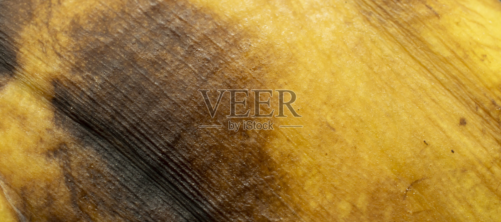 熟香蕉皮。背景或纹理照片摄影图片