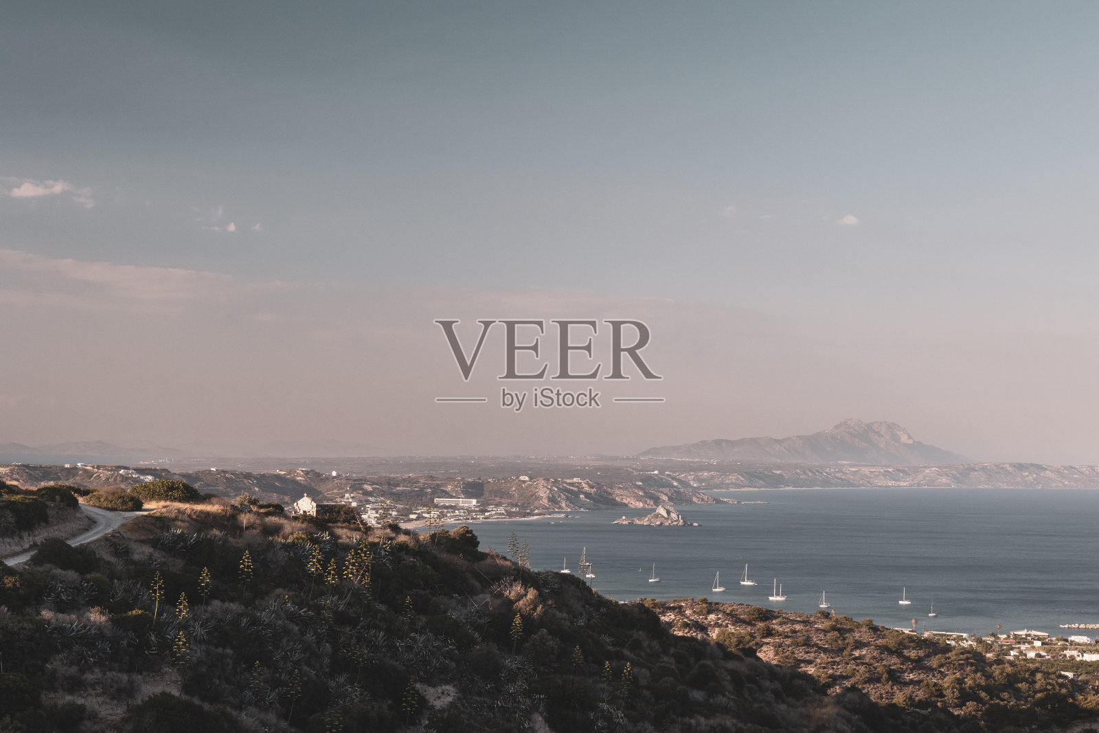 科斯海滩的日落照片摄影图片