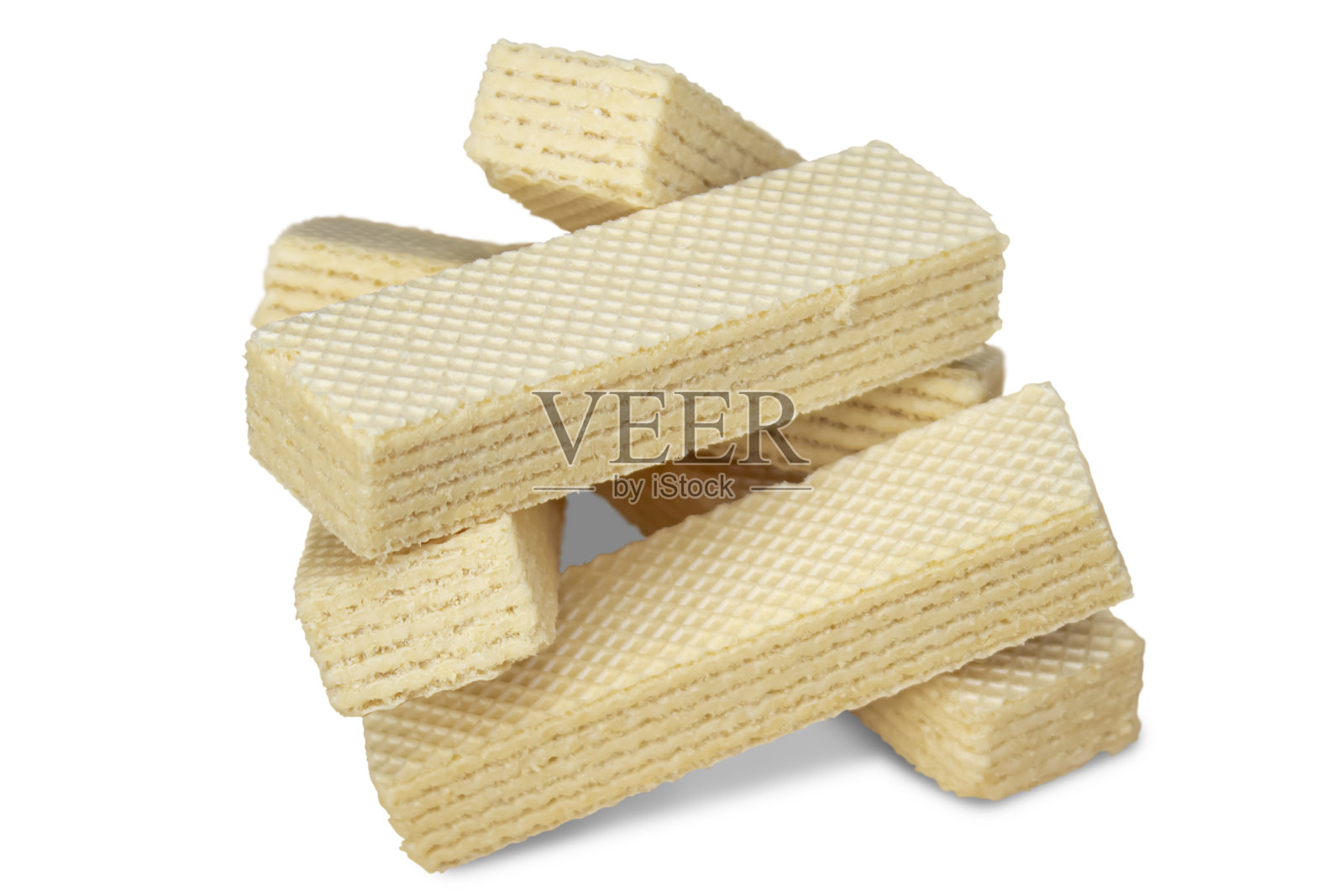 牛奶脆饼堆成一堆。照片摄影图片