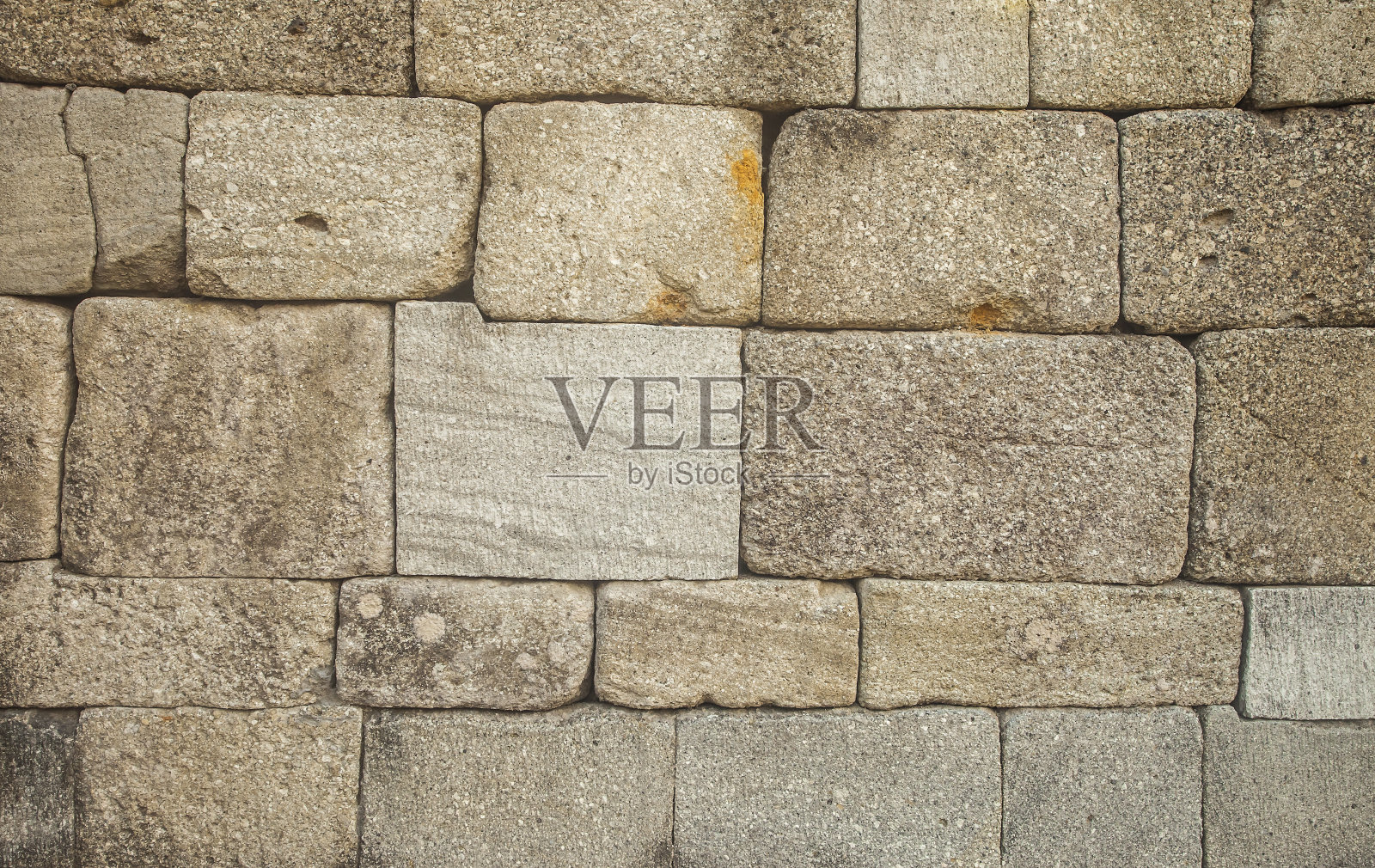 古石墙的背景和纹理。这些石块在印度尼西亚爪哇地区被用来建造寺庙。照片摄影图片