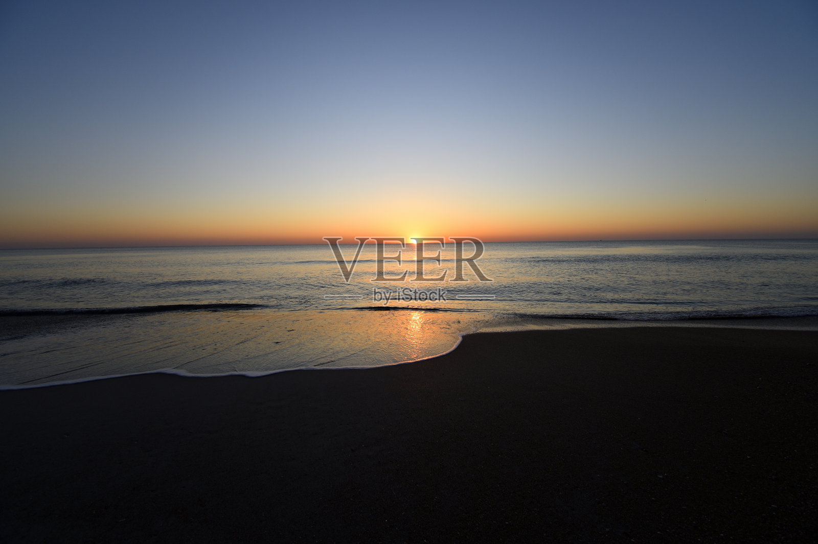 海洋上的日出照片摄影图片