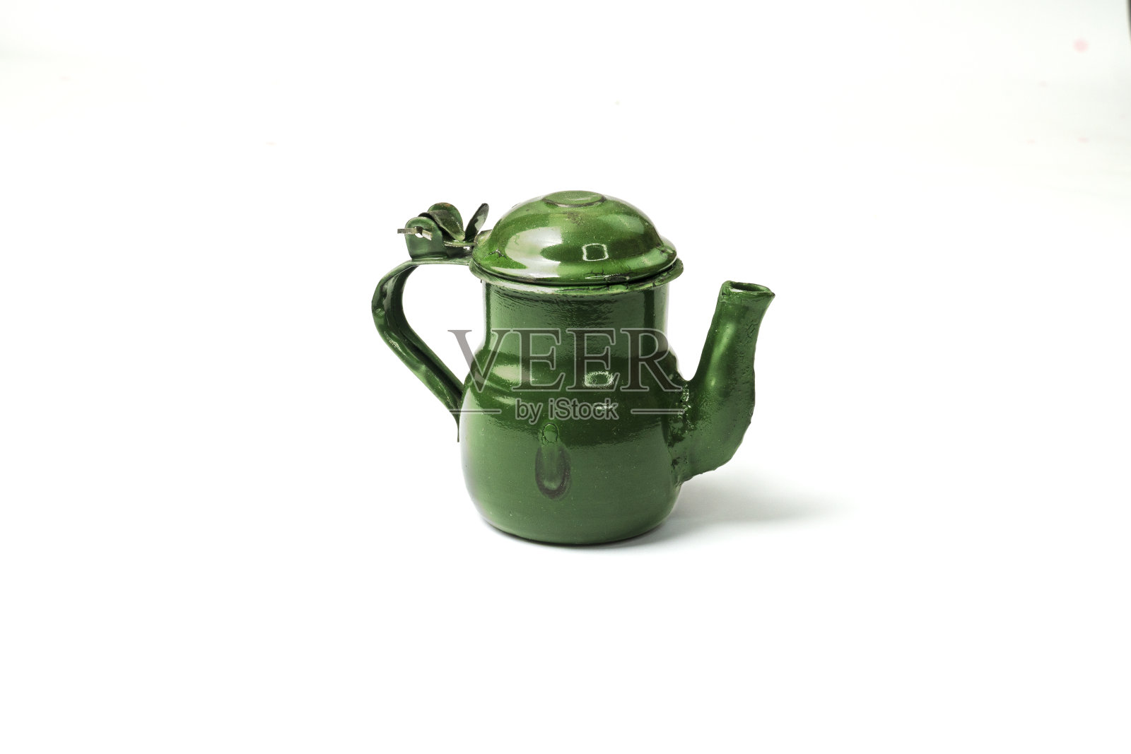 茶壶：白色背景上的印度著名茶壶照片摄影图片