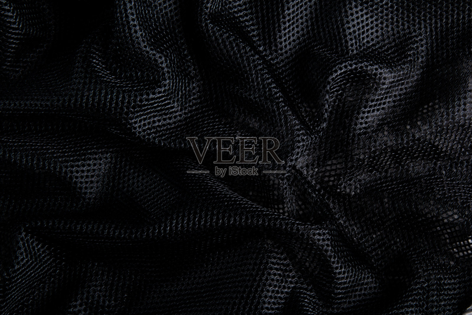 黑色面料质感。波浪纹理背景照片摄影图片