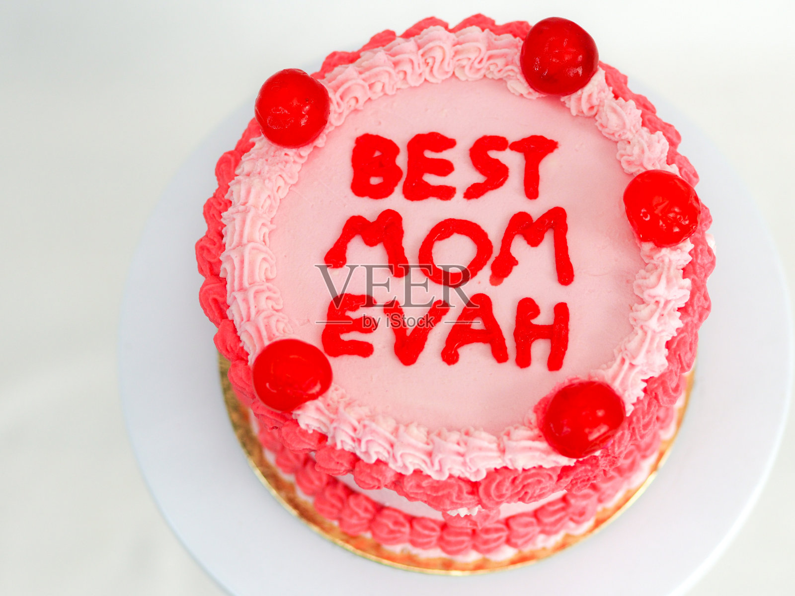 母亲节蛋糕，上面有搞笑的文字，最好的妈妈照片摄影图片