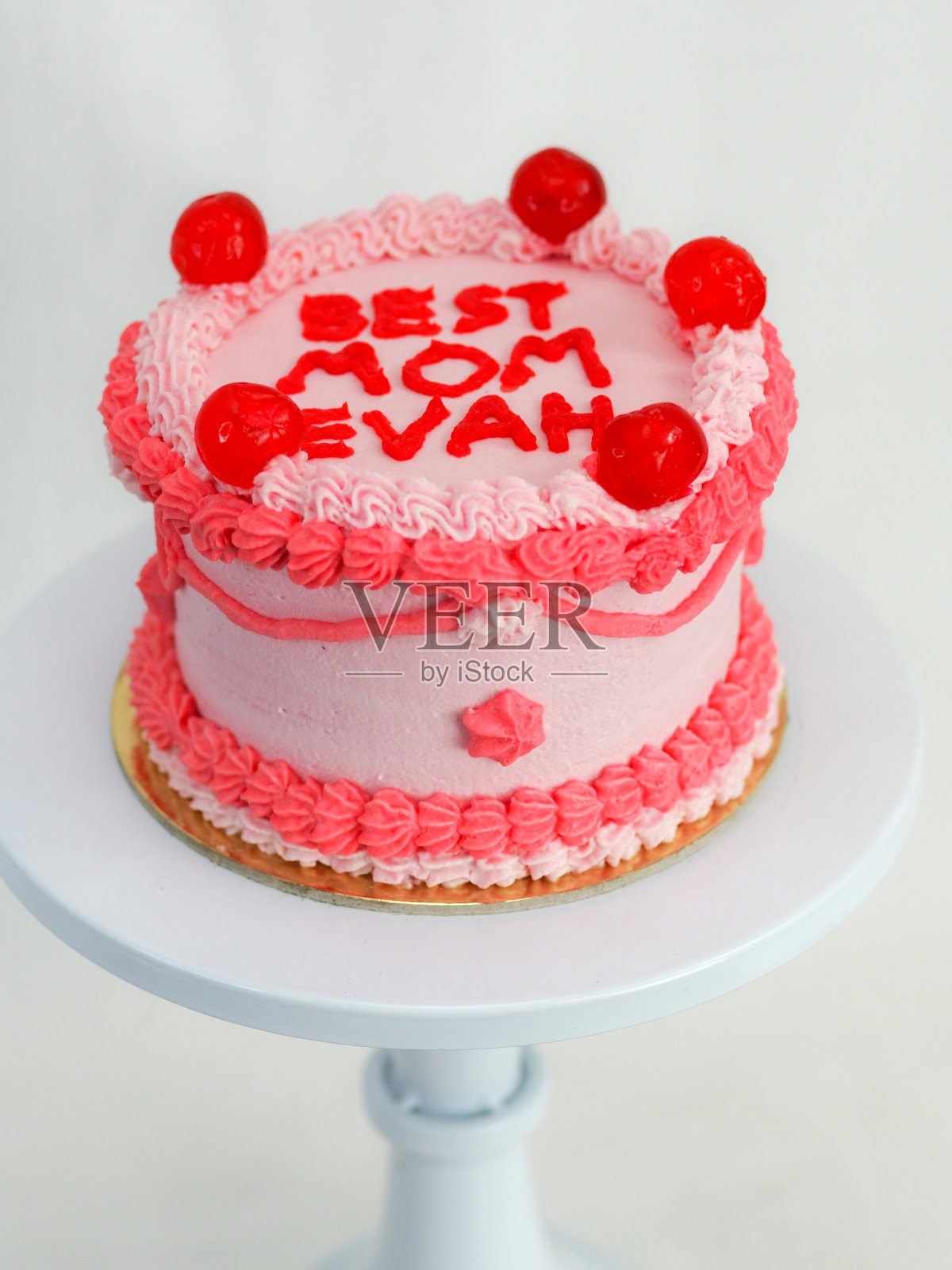 母亲节蛋糕，上面有搞笑的文字，最好的妈妈照片摄影图片