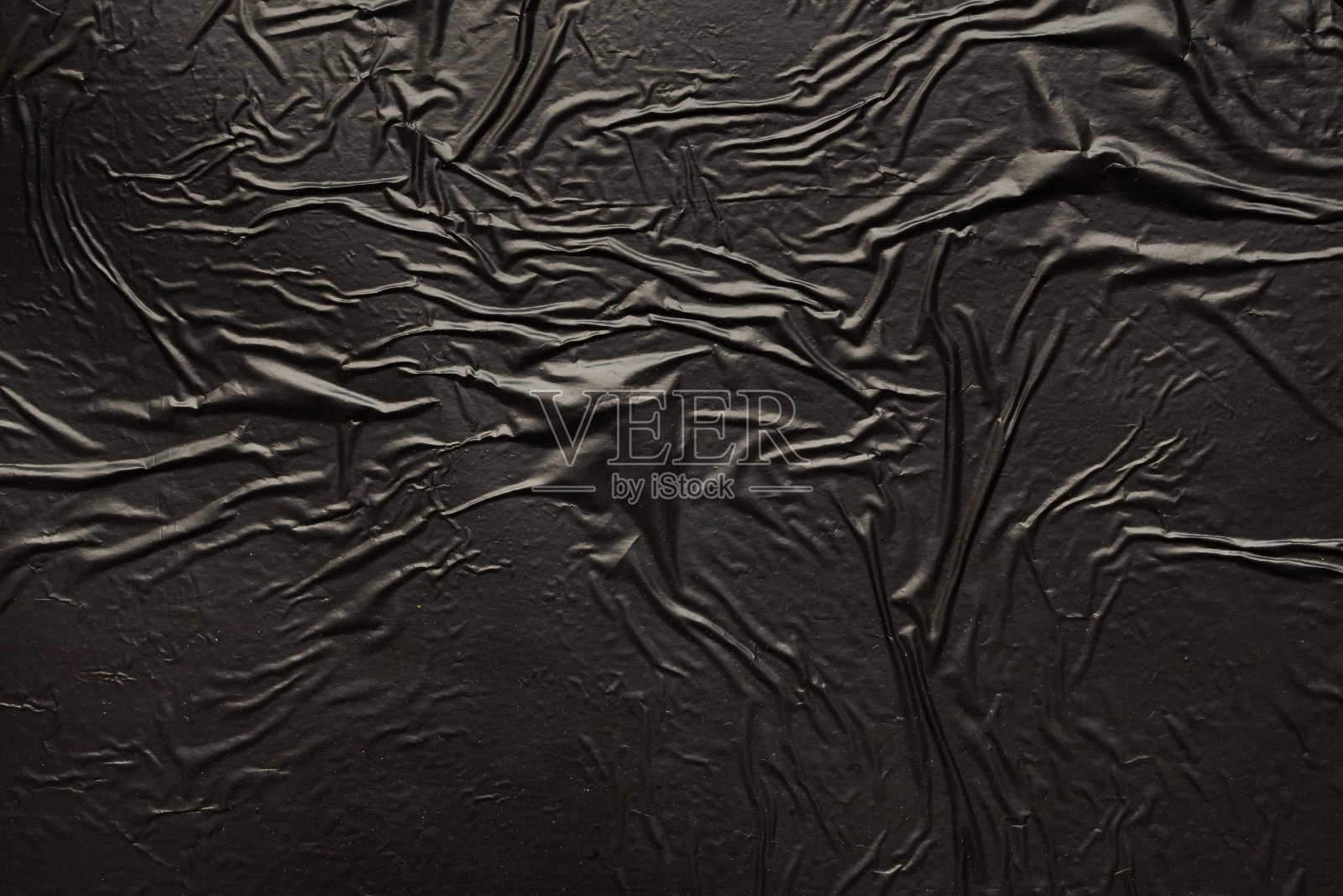 黑色褶皱和折痕塑料袋纹理背景照片摄影图片