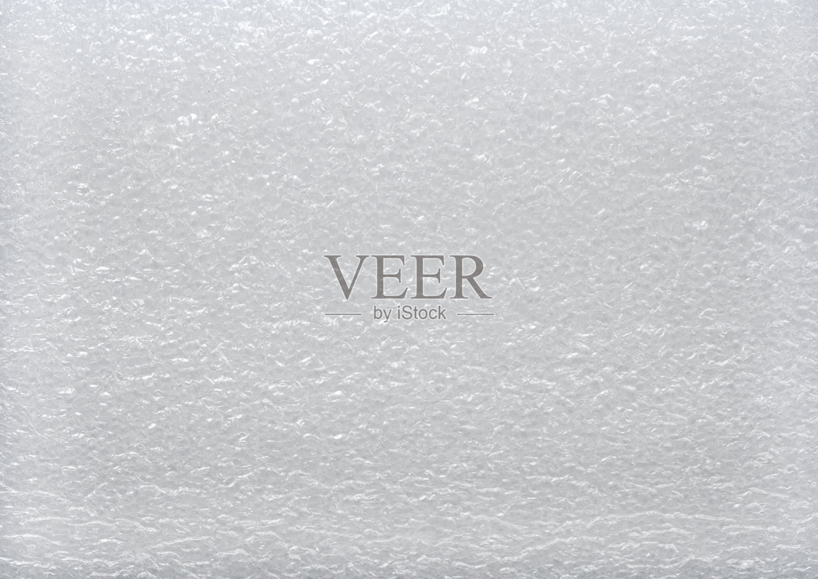 白色海绵背景和纹理。花的泡沫。照片摄影图片