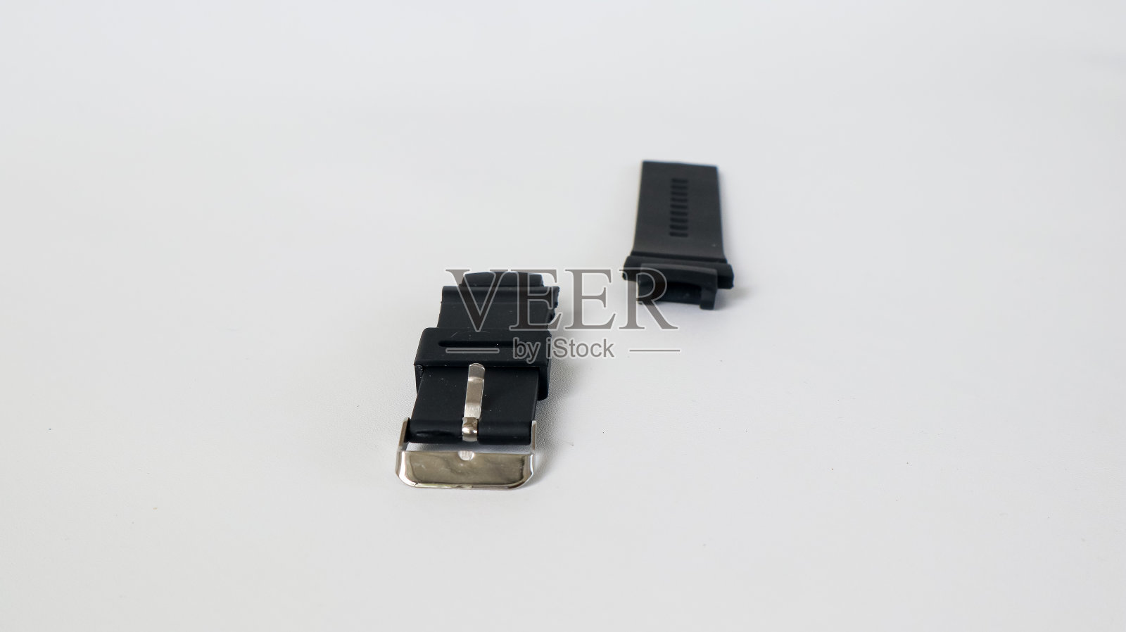 黑色表带在白色的背景照片摄影图片