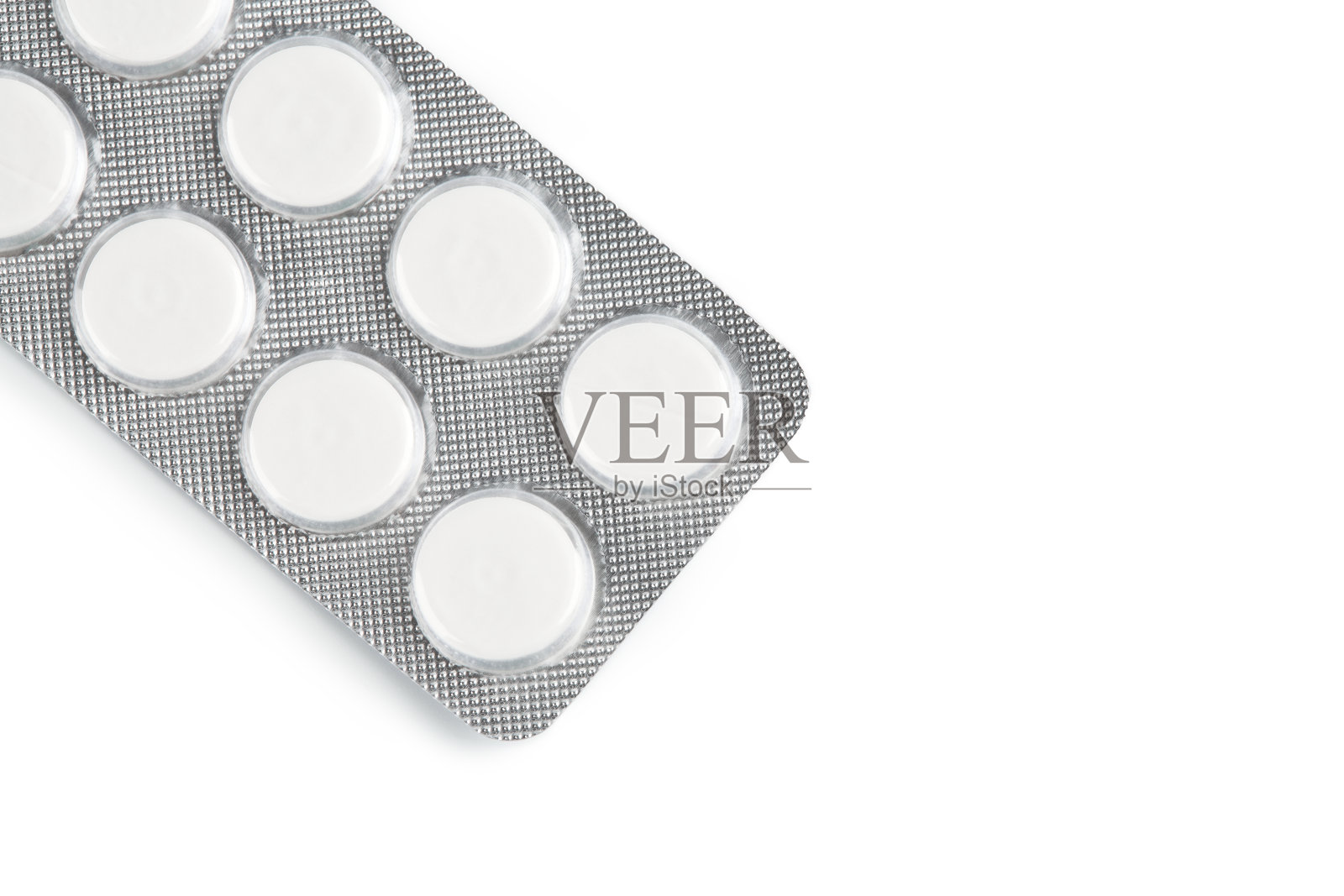 桌子上放着不同颜色的药片。五颜六色的抗菌药丸、药胶囊。药物、抗生素、药丸、药物。水疱包装抗生素和药片俯视图。照片摄影图片