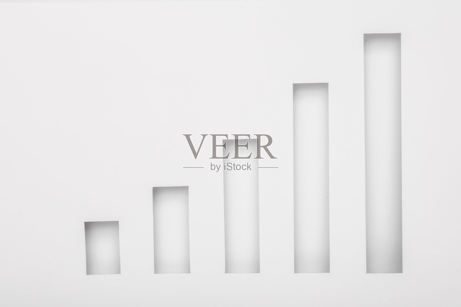 把纸剪成图表的形状。经营理念照片摄影图片