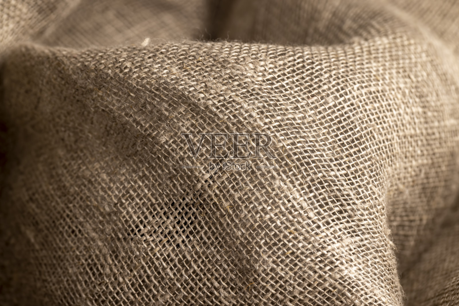用于缝制衣服和其他东西的灰色亚麻织物照片摄影图片