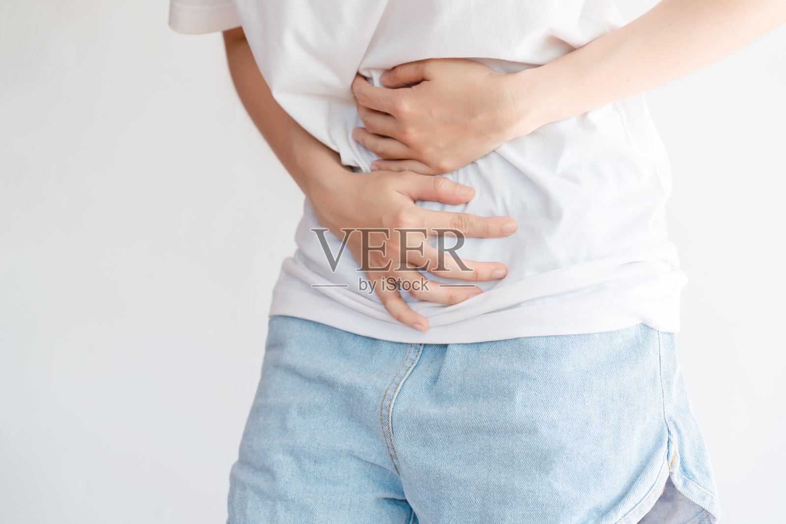 一个女人胃痛。医疗保健理念。照片摄影图片