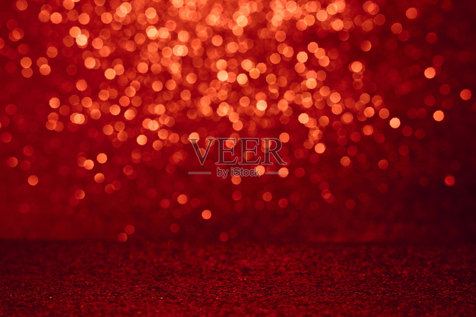 圣诞快乐背景上的红色散景灯照片摄影图片