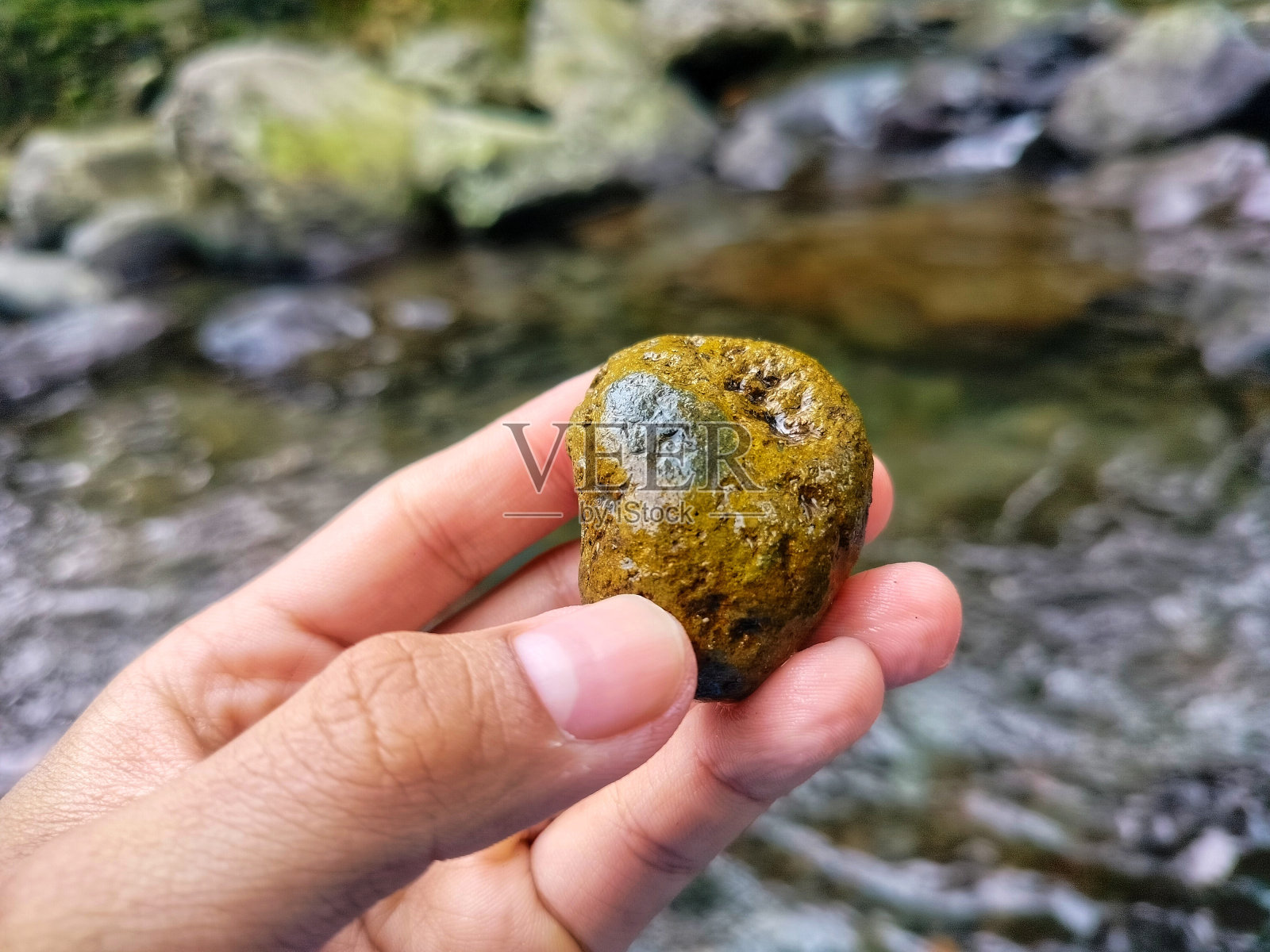 有小洞的黄色石头照片摄影图片