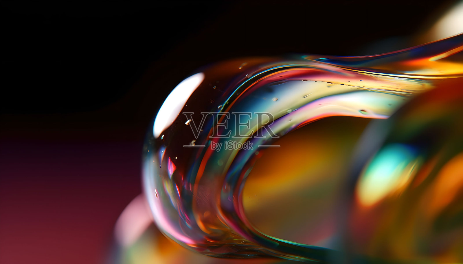 微距拍摄的玻璃与彩色色调对黑色背景照片摄影图片