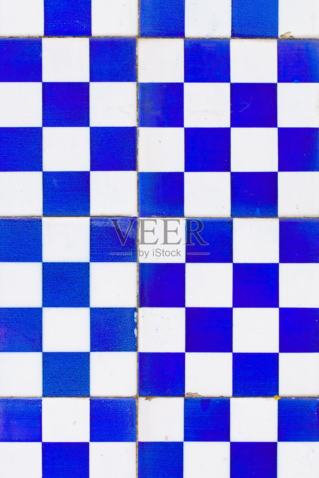 风化瓷砖图案蓝白，特写照片摄影图片