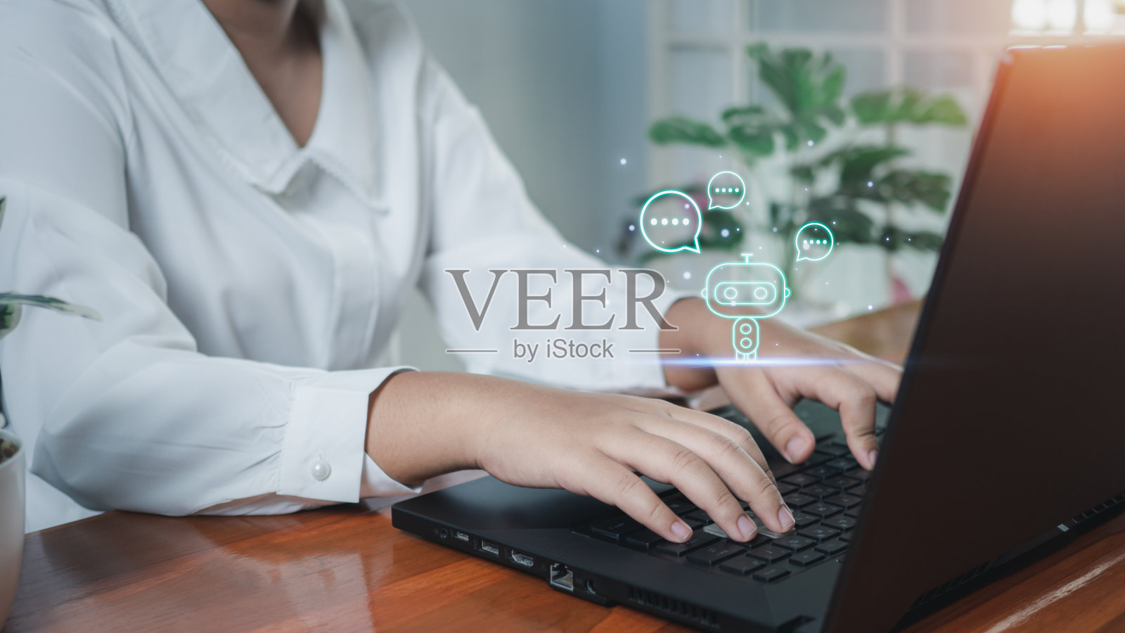 商业女性正在使用人工智能来帮助她们在电脑上工作。和Ai聊天。聊天机器人。照片摄影图片