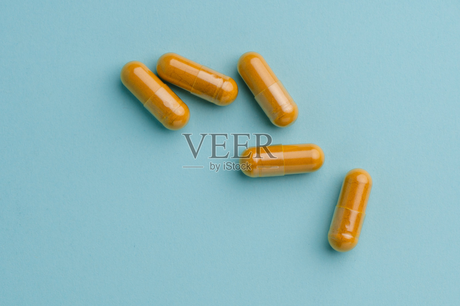 姜黄胶囊照片摄影图片