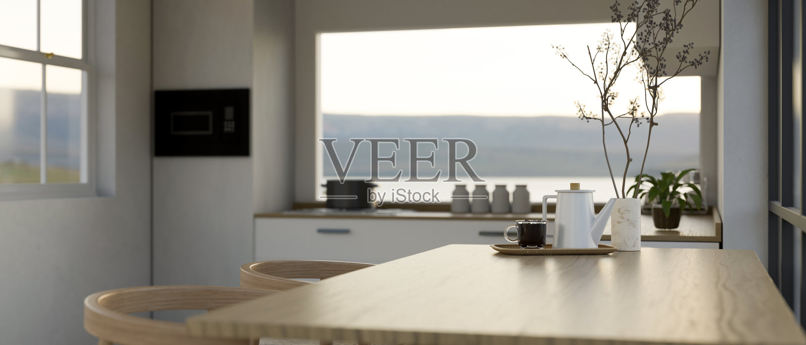 在现代白色厨房的木制餐桌上复制空间。照片摄影图片