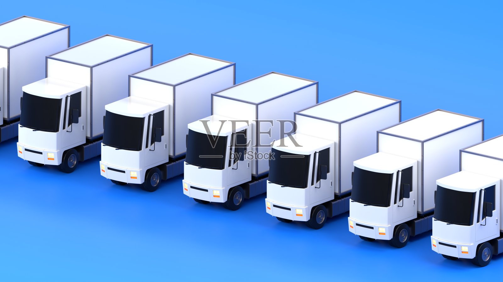 一排蓝色背景的货车照片摄影图片