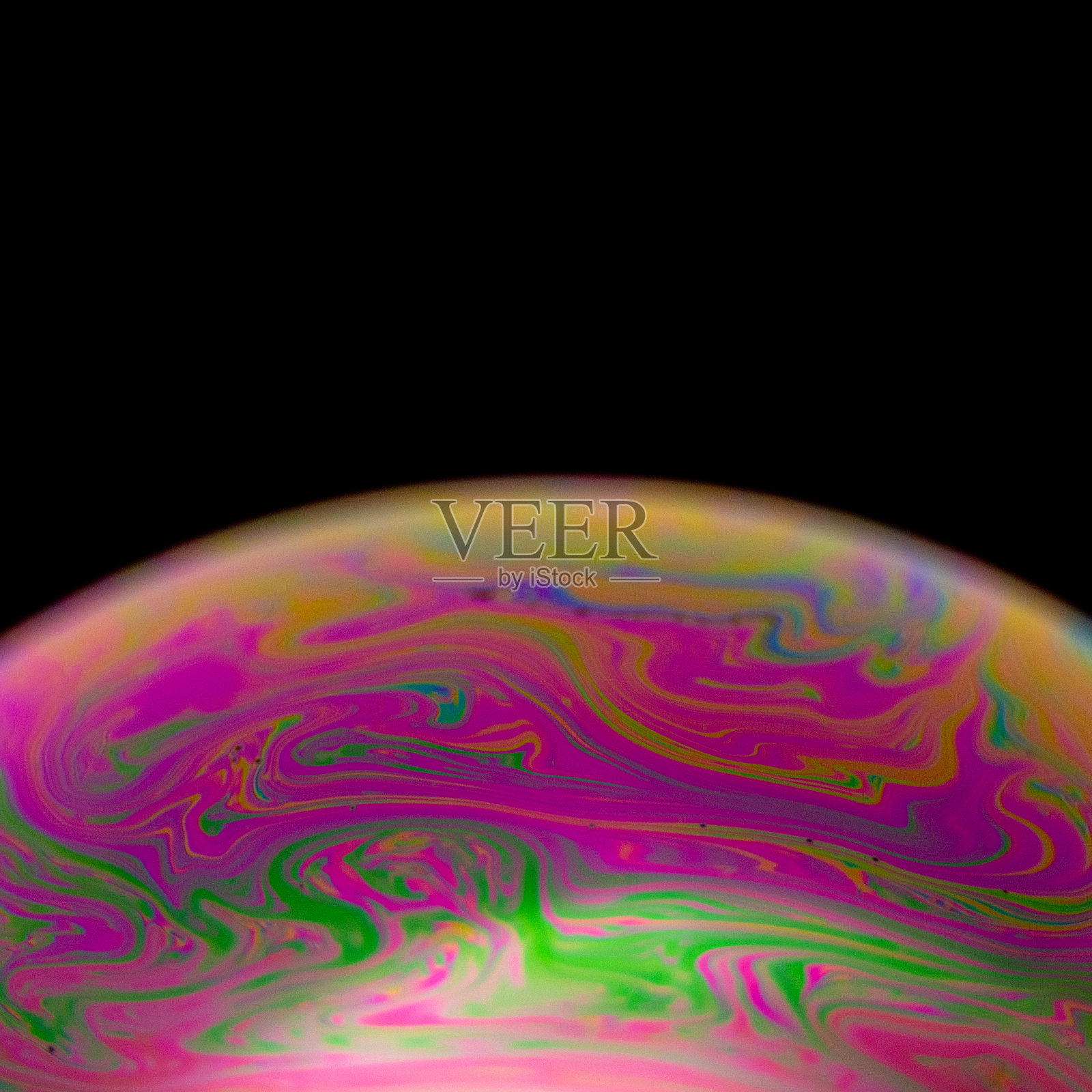 肥皂泡橙色逐渐变成粉色和绿色照片摄影图片