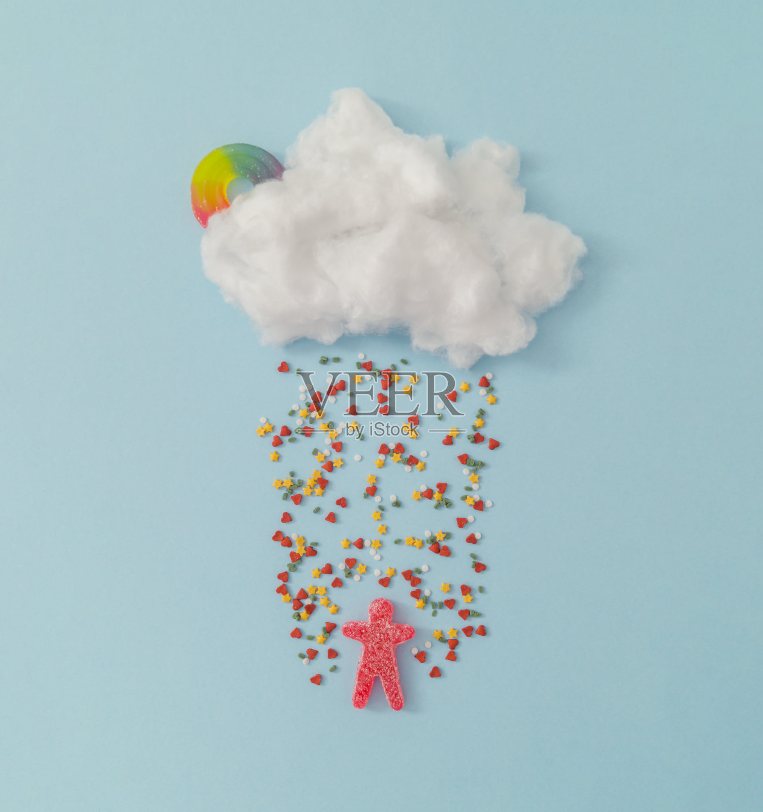 创意云与五颜六色的糖屑和软糖。最小的概念背景。照片摄影图片