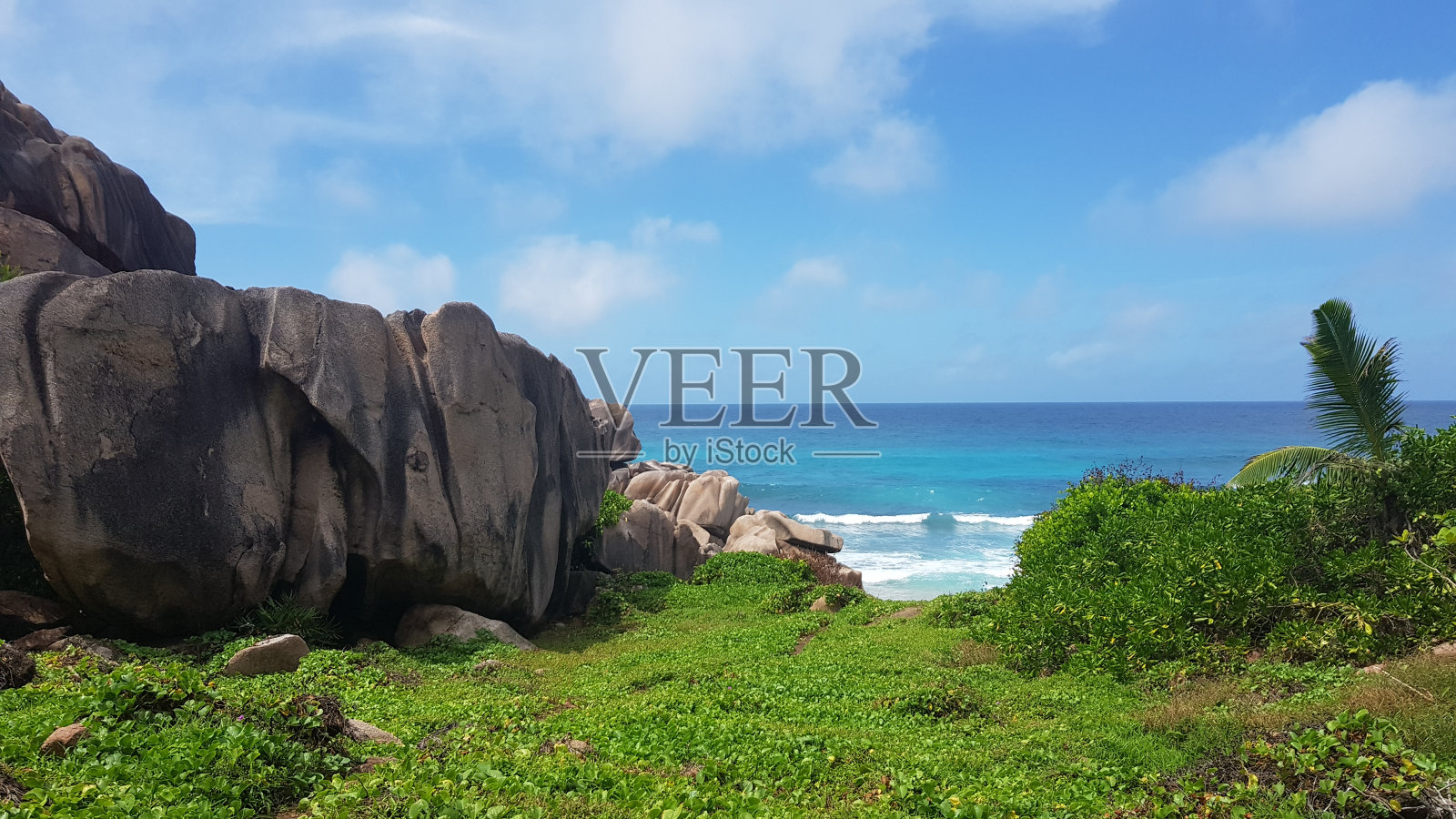 巨大的岩石和海景，拉迪格，塞舌尔照片摄影图片