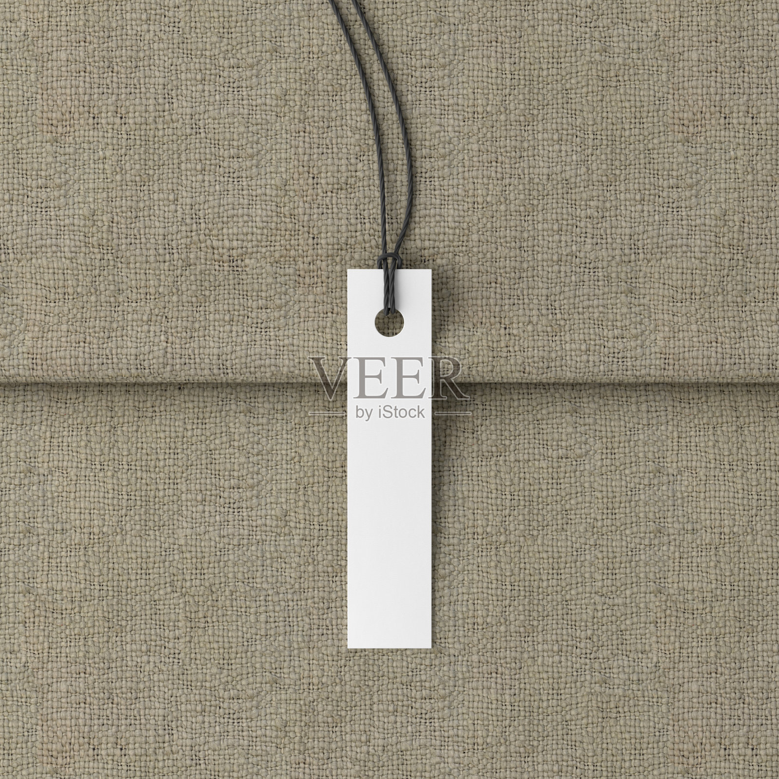 白色长标签模型织物背景。俯瞰上方照片摄影图片