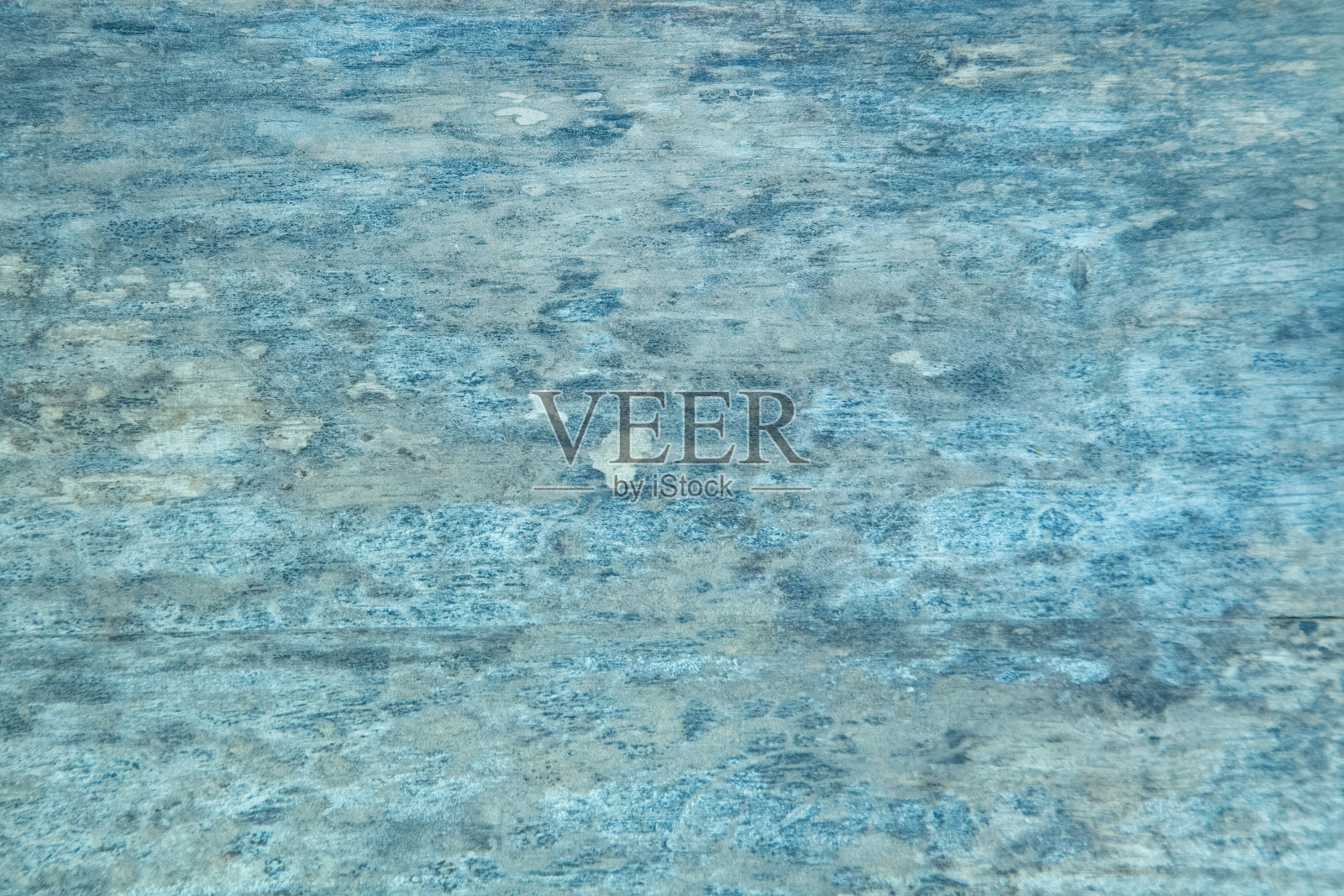 抽象的蓝色背景与老化的效果画表面。照片摄影图片