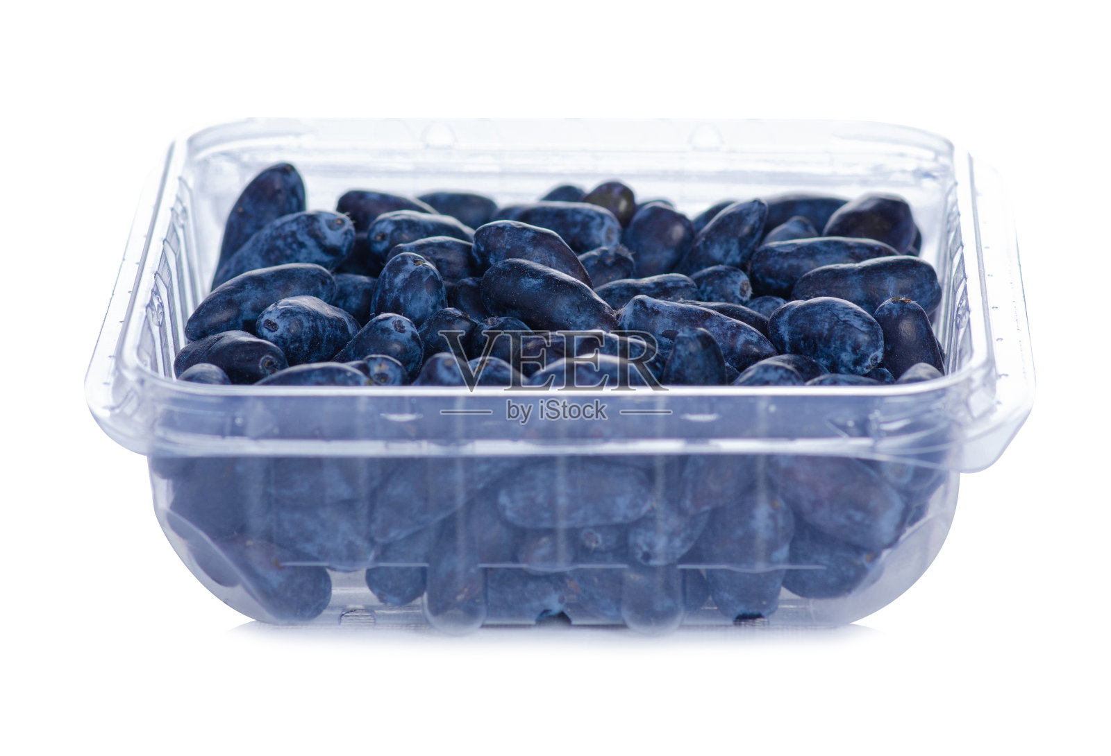 塑料容器中的金银花水果照片摄影图片