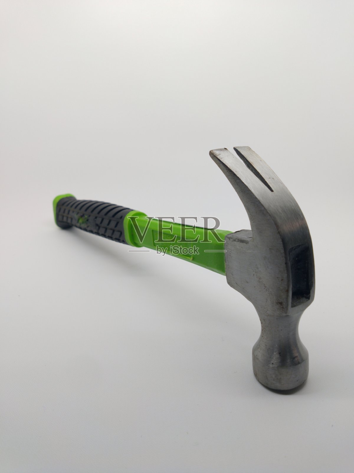 绿色小锤子孤立在白色背景照片摄影图片